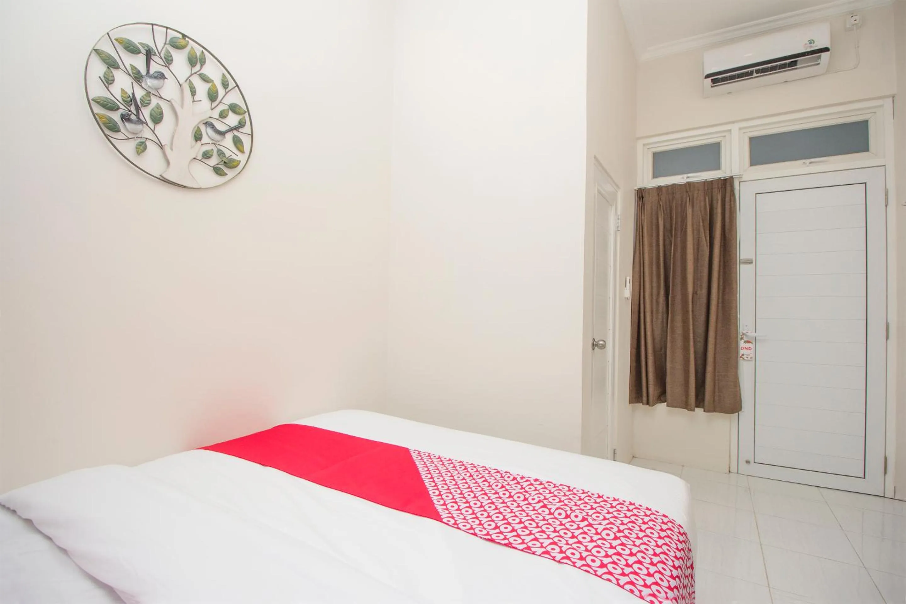 Bedroom in OYO 647 Irooms Homestay