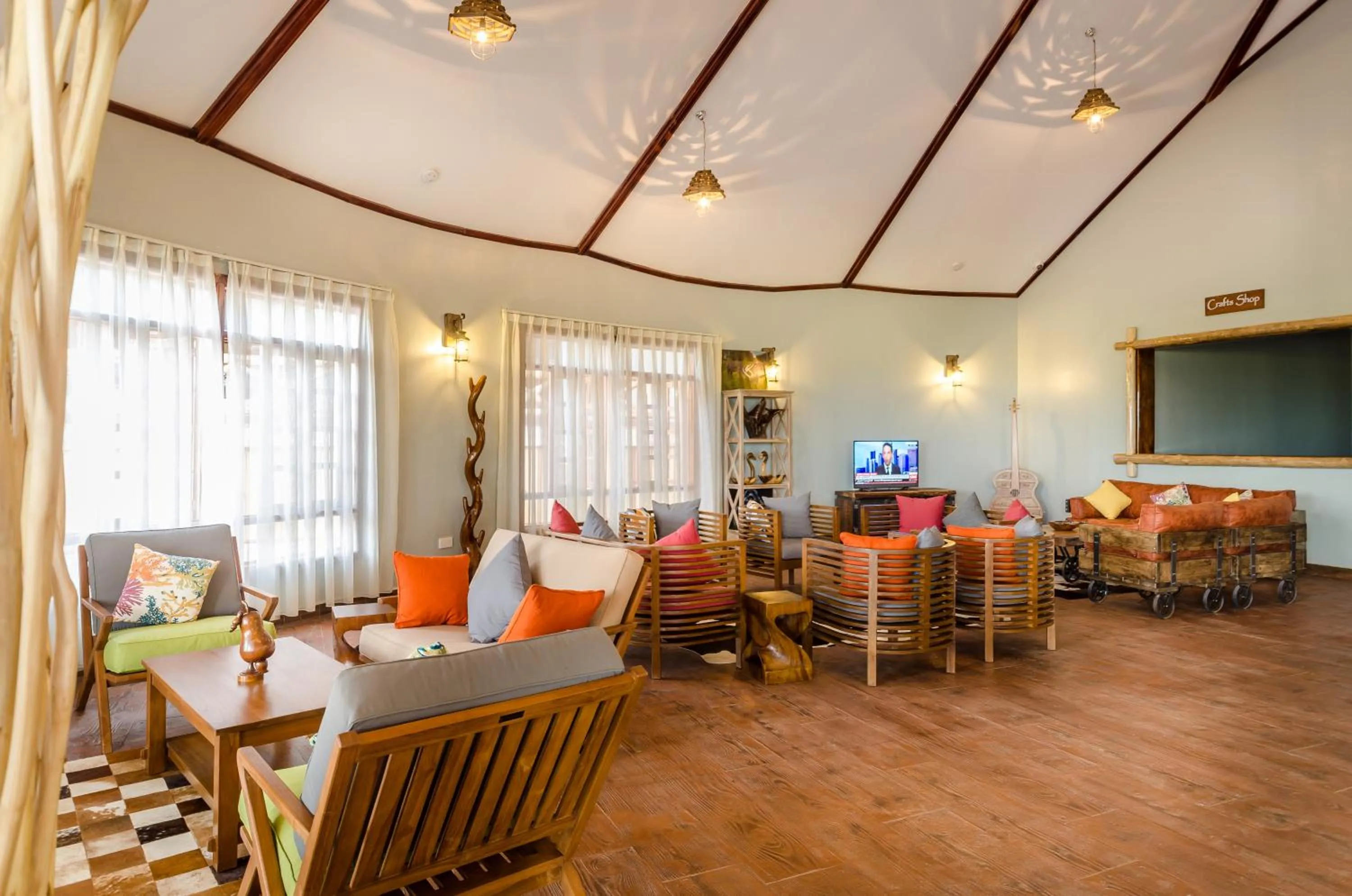Communal lounge/ TV room in Emburara Farm Lodge