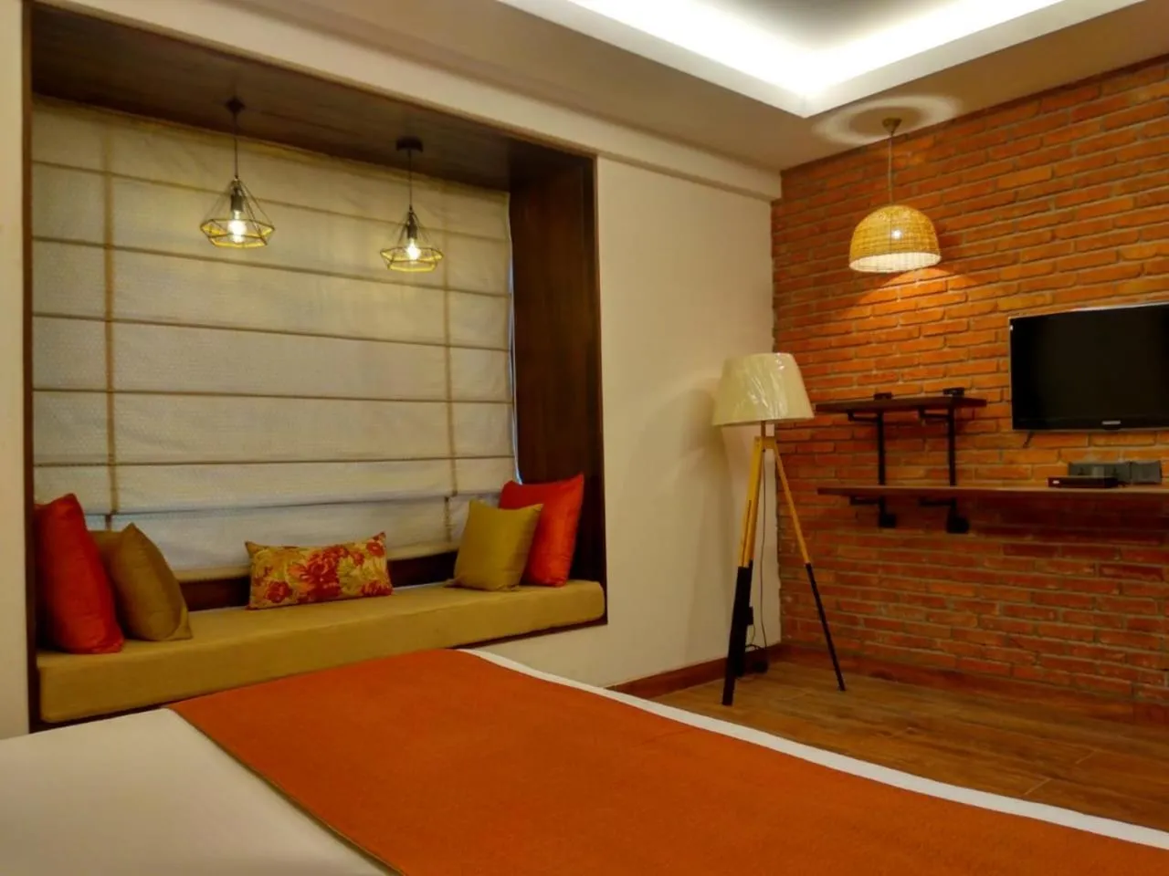 Seating area, Bed in Virohaa Hotel