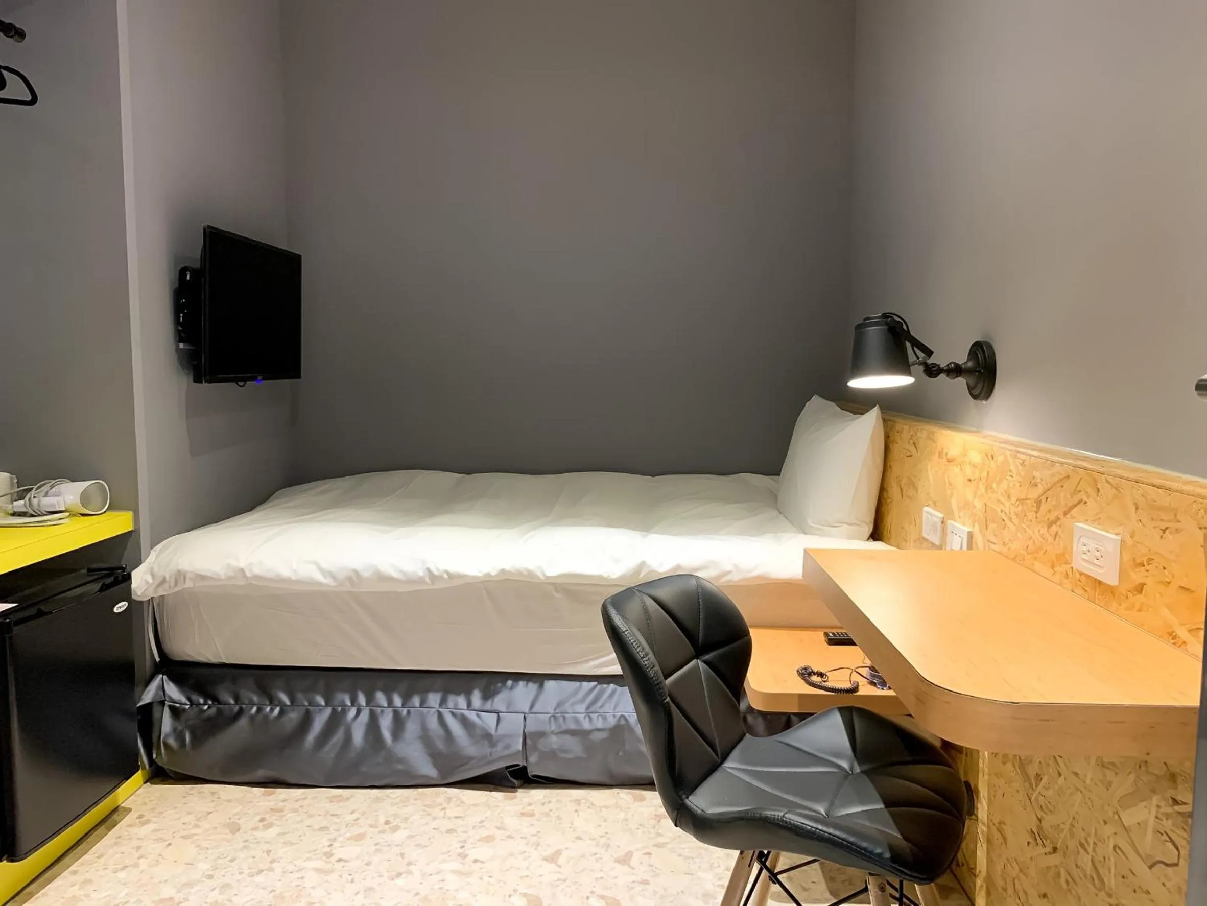 Bed in Raise Hotel Taichung