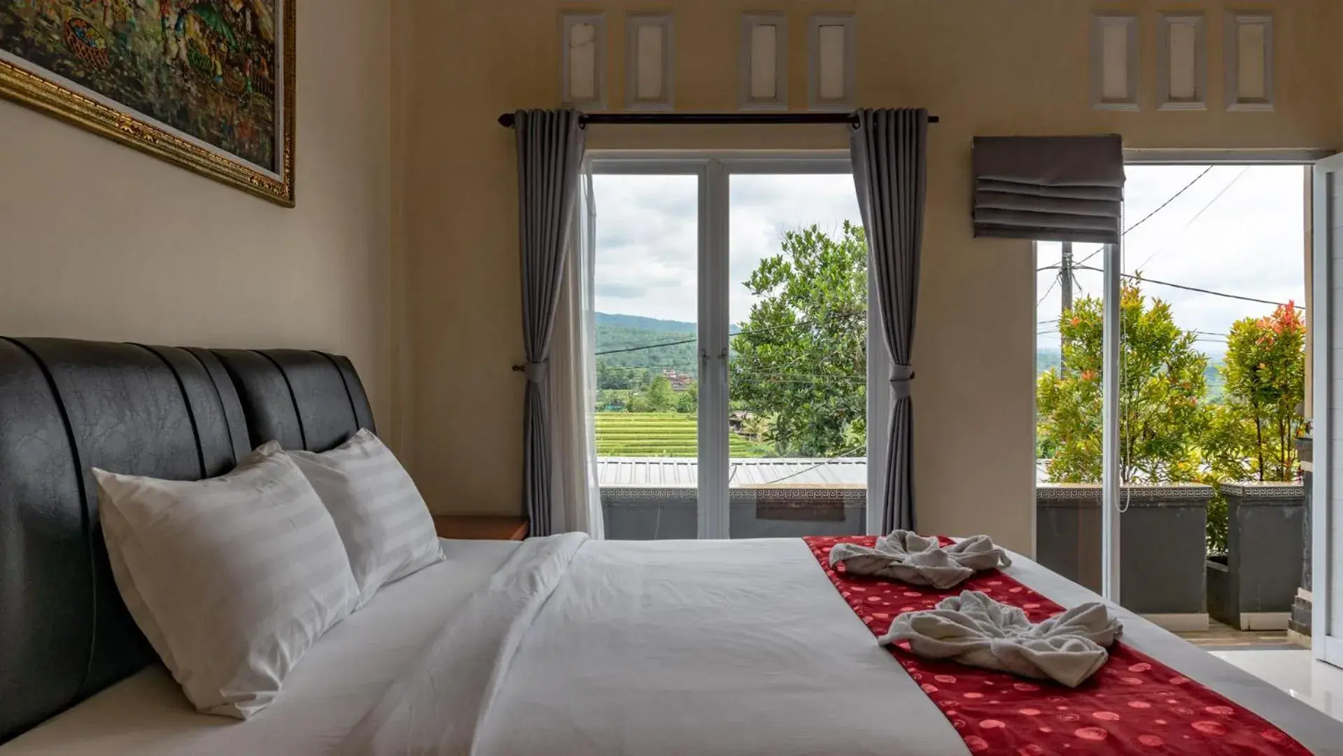 View (from property/room), Bed in Adhi Jaya Suite View (from property/room), Bed in Adhi Jaya Suite