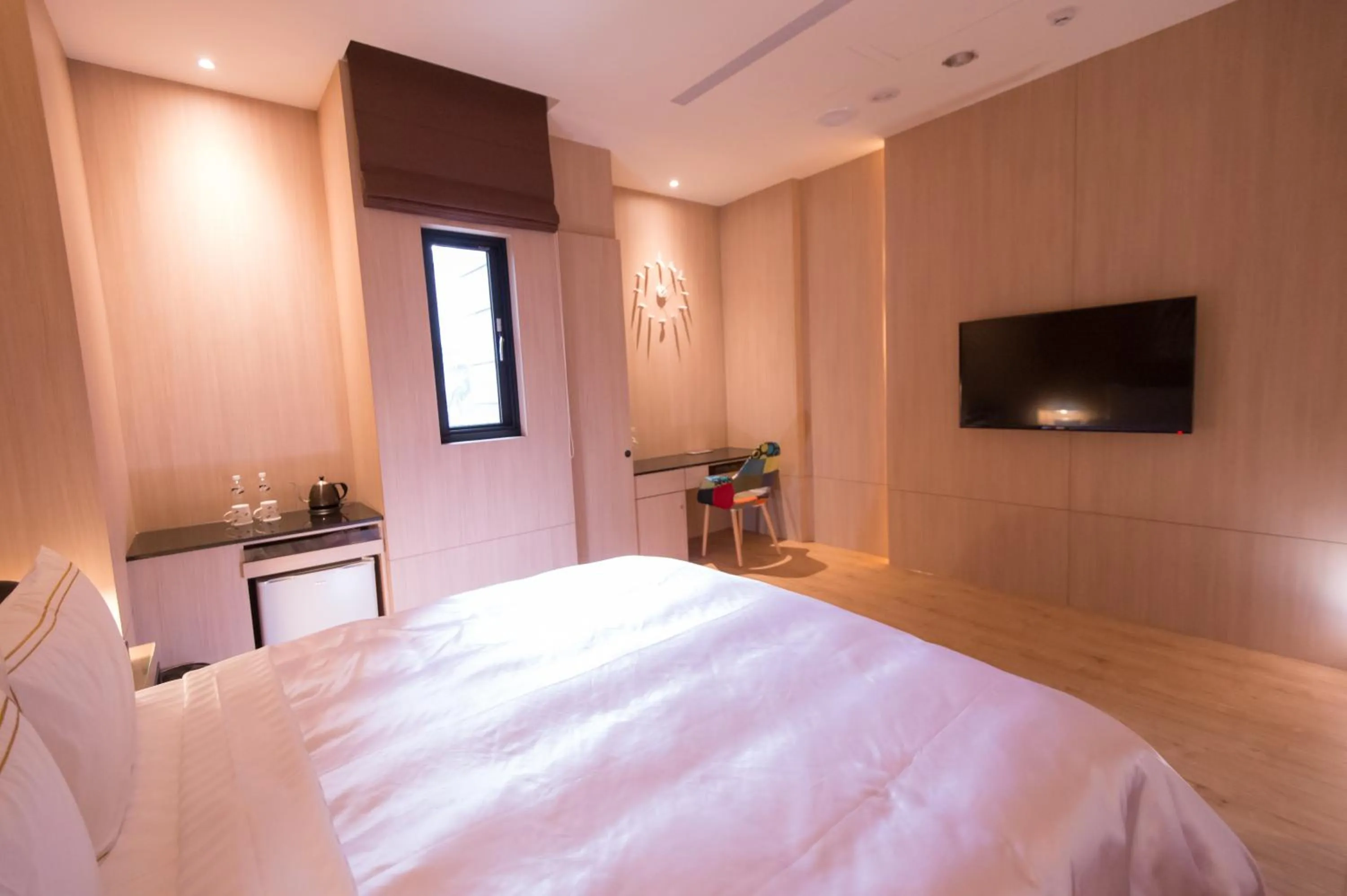 Bed in J Moon Villa Motel