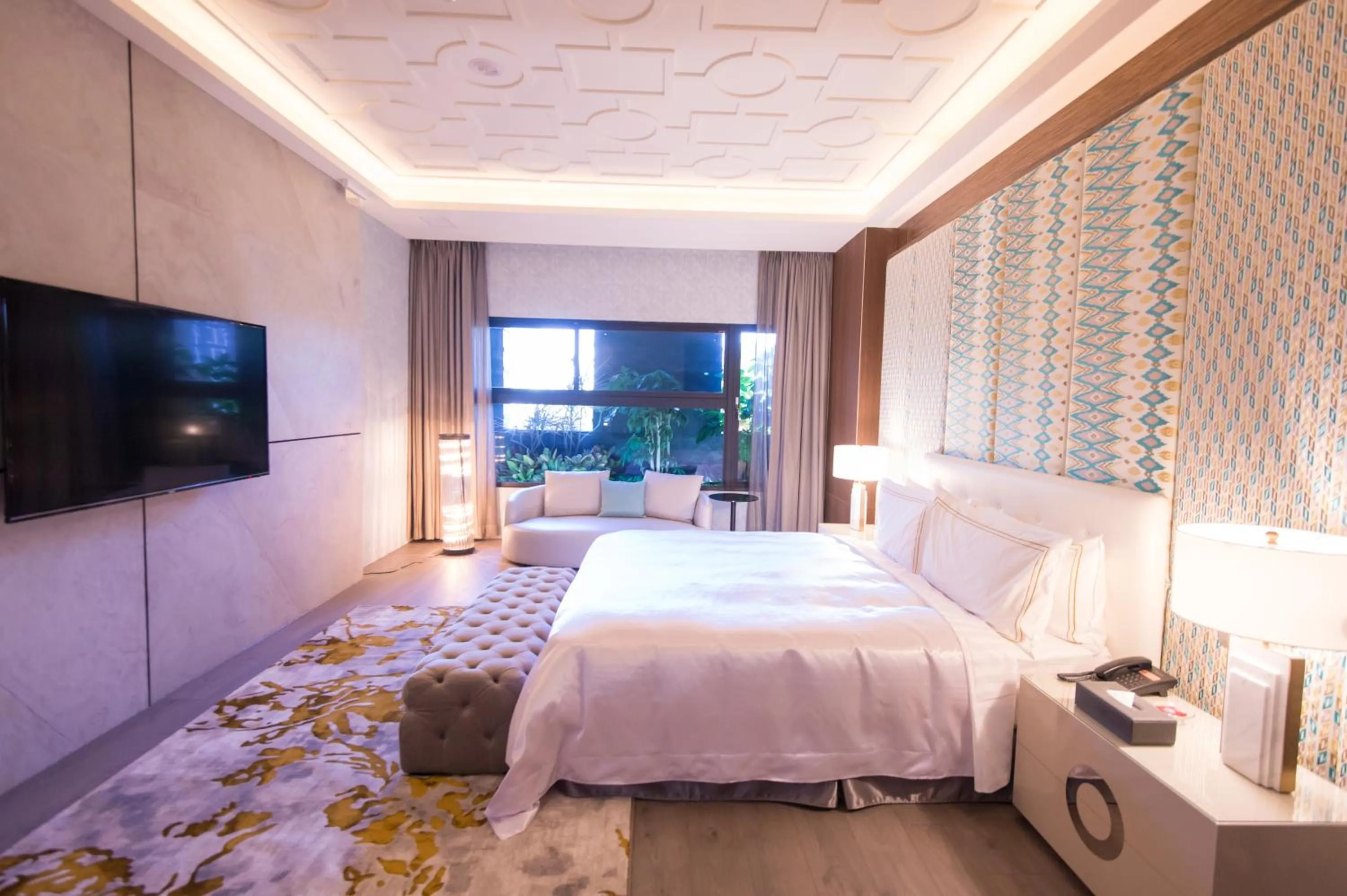 Bed in J Moon Villa Motel