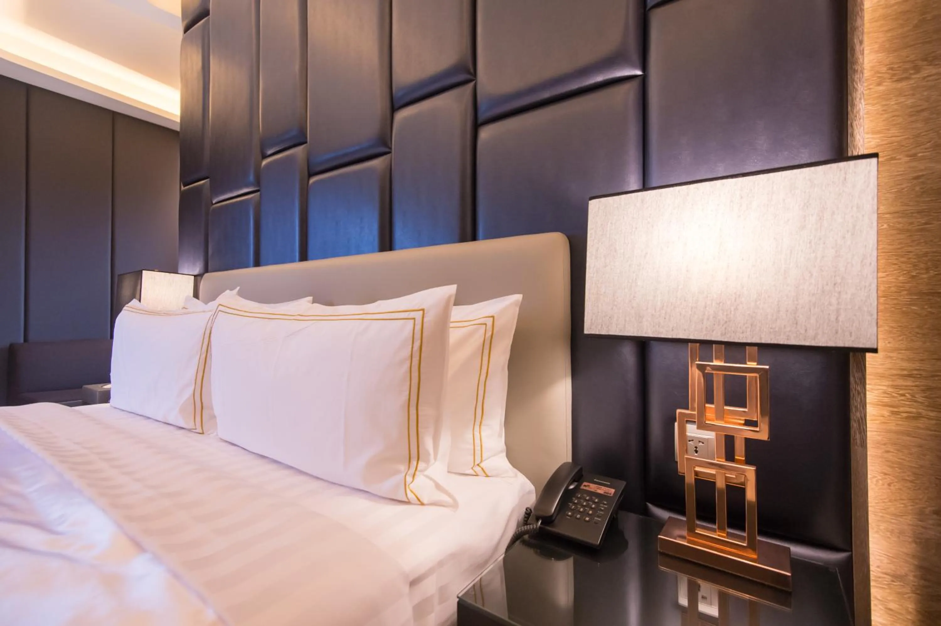 Bed in J Moon Villa Motel