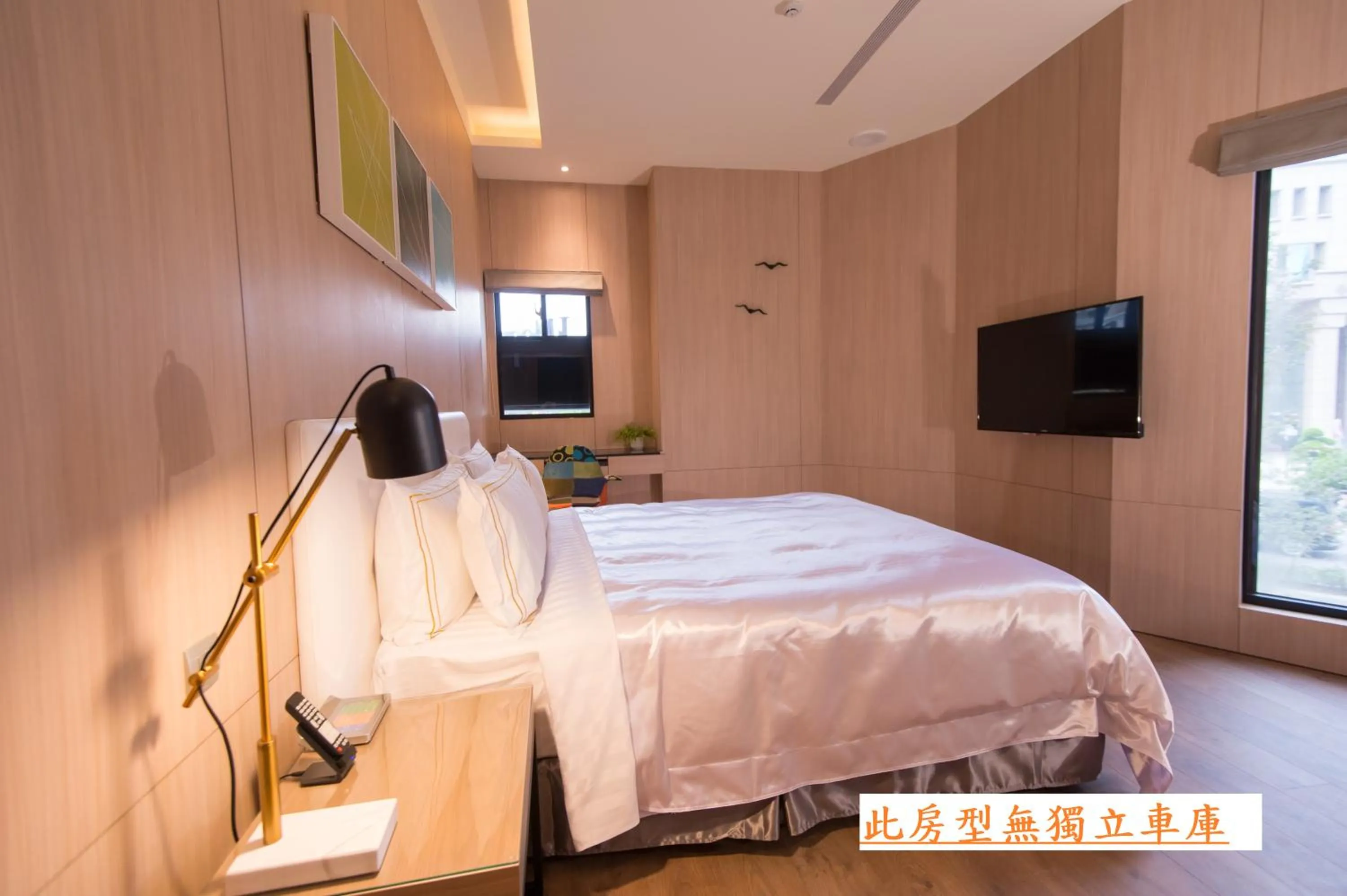 Bed in J Moon Villa Motel