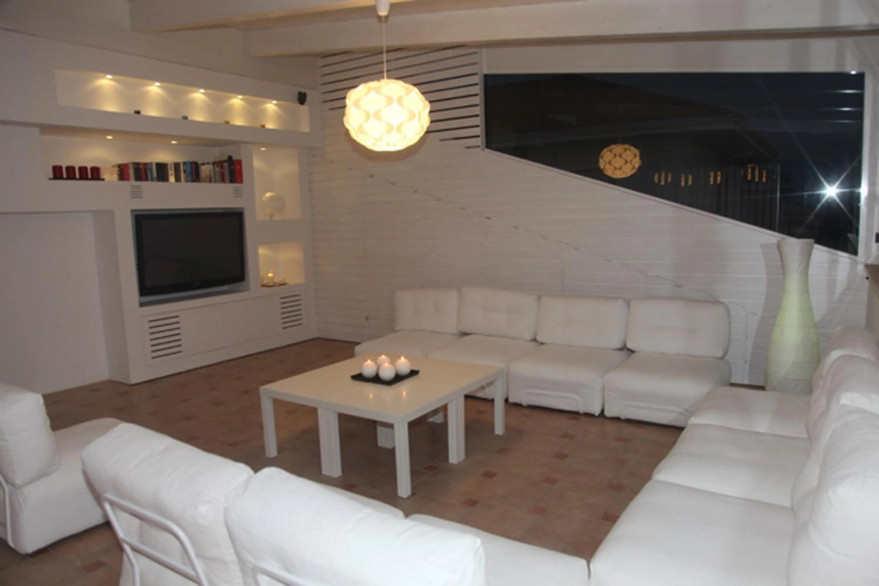 Communal lounge/ TV room in Il Falco e Il Gabbiano