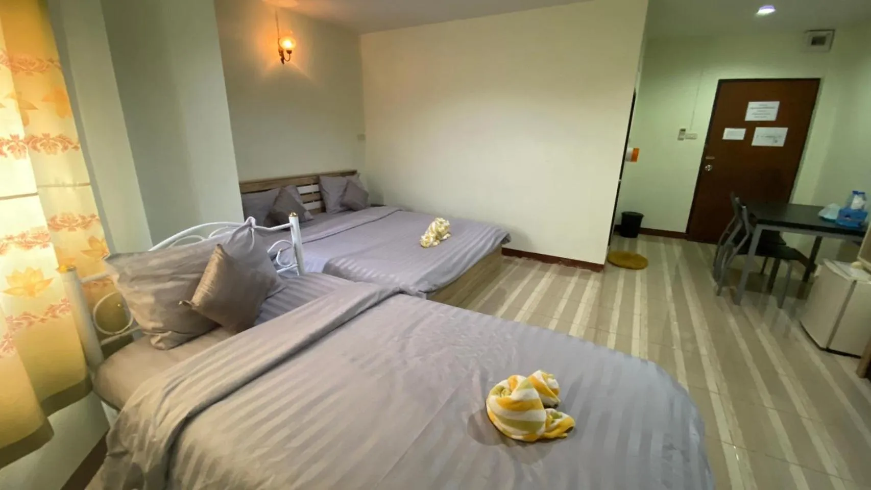 Bed in Alongkorn hotel by SB