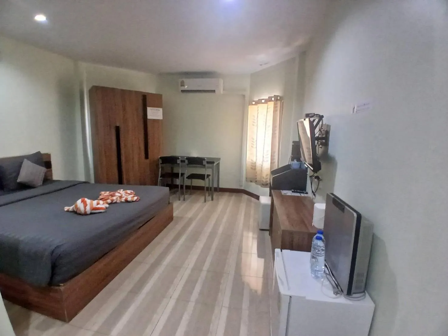 Bed in Alongkorn hotel by SB