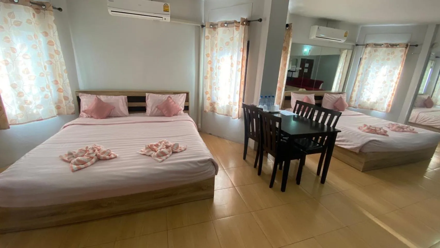 Bed in Alongkorn hotel by SB