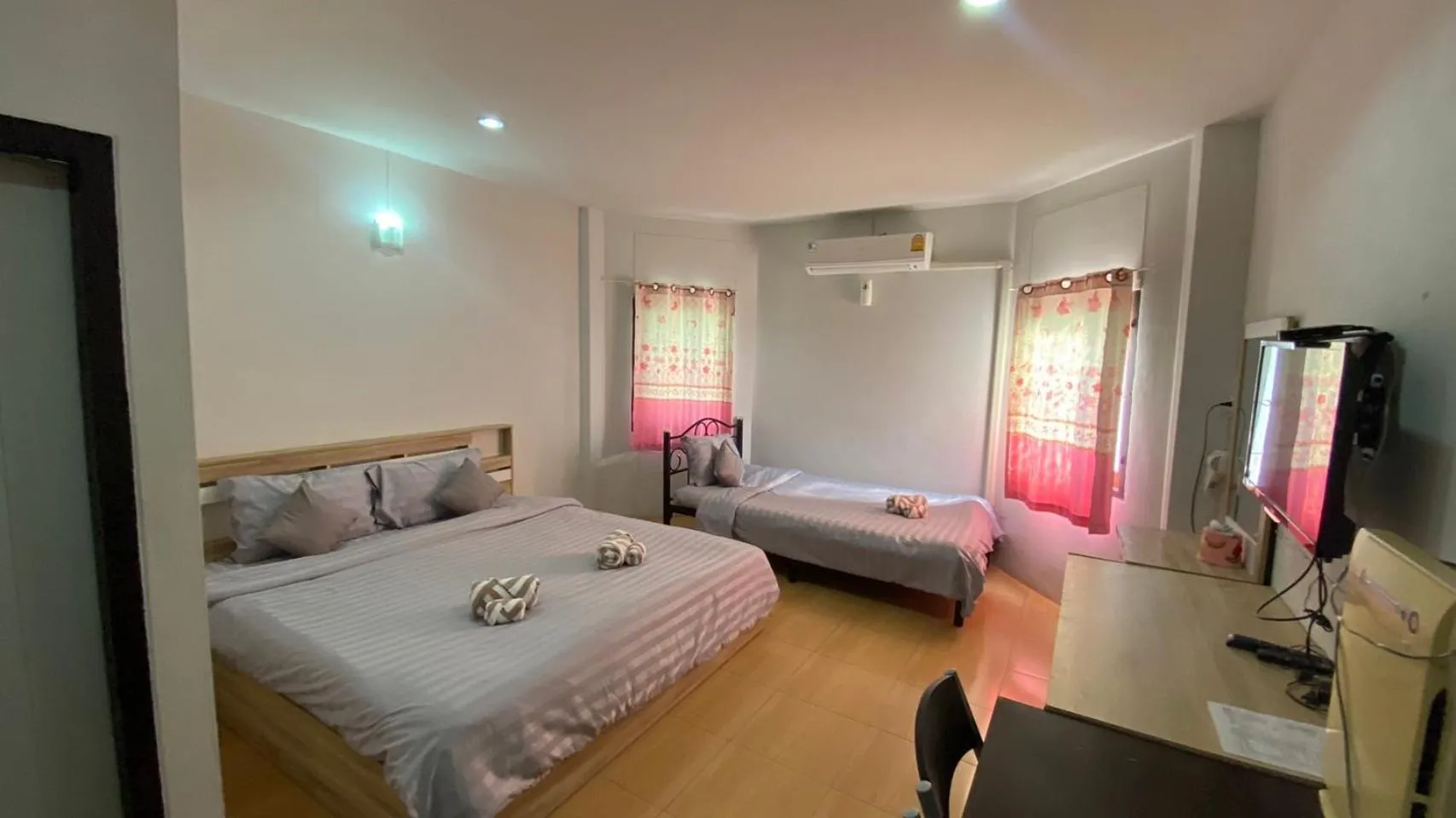 Bed in Alongkorn hotel by SB