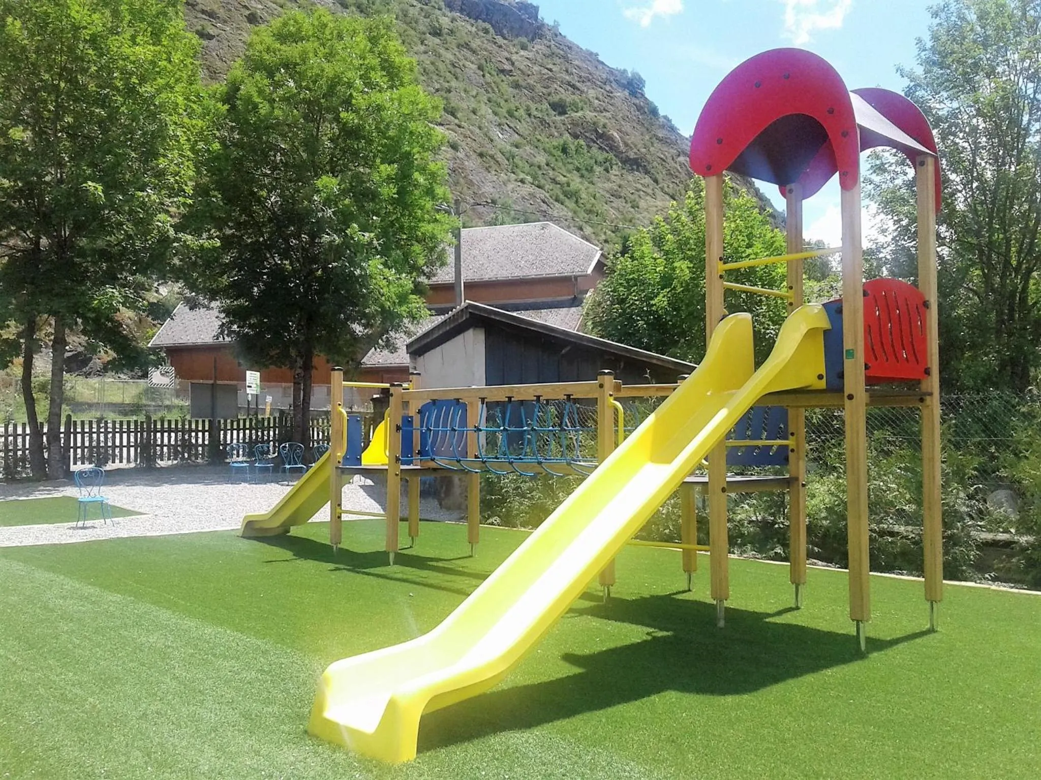 Children play ground in A La Rencontre Du Soleil - Camping