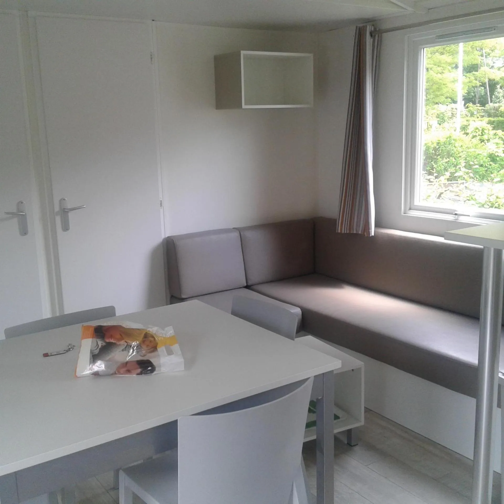Living room in A La Rencontre Du Soleil - Camping