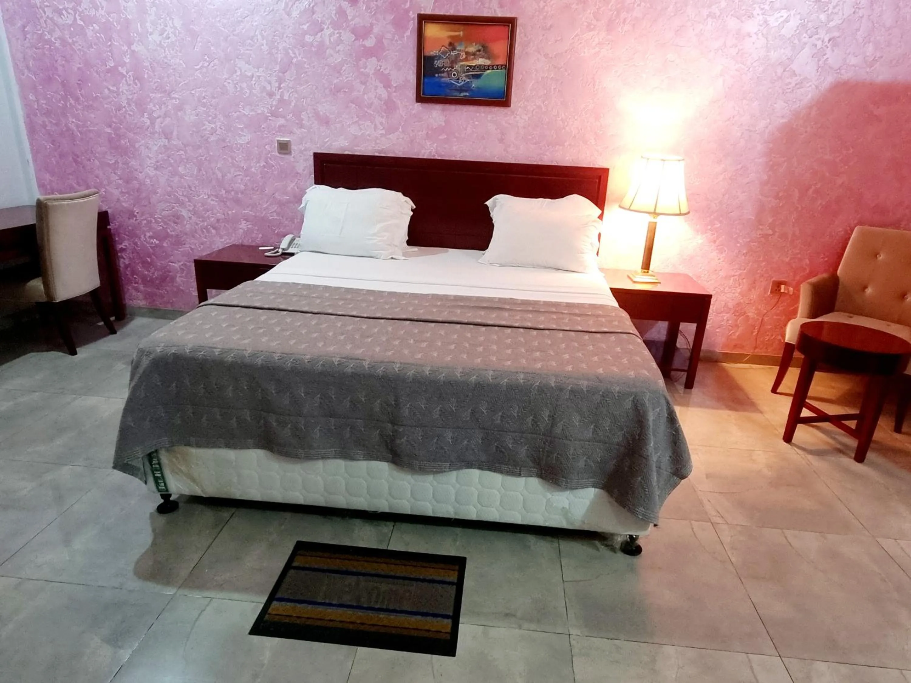 Bed in HOTEL AMBASSADORS ANNEXE