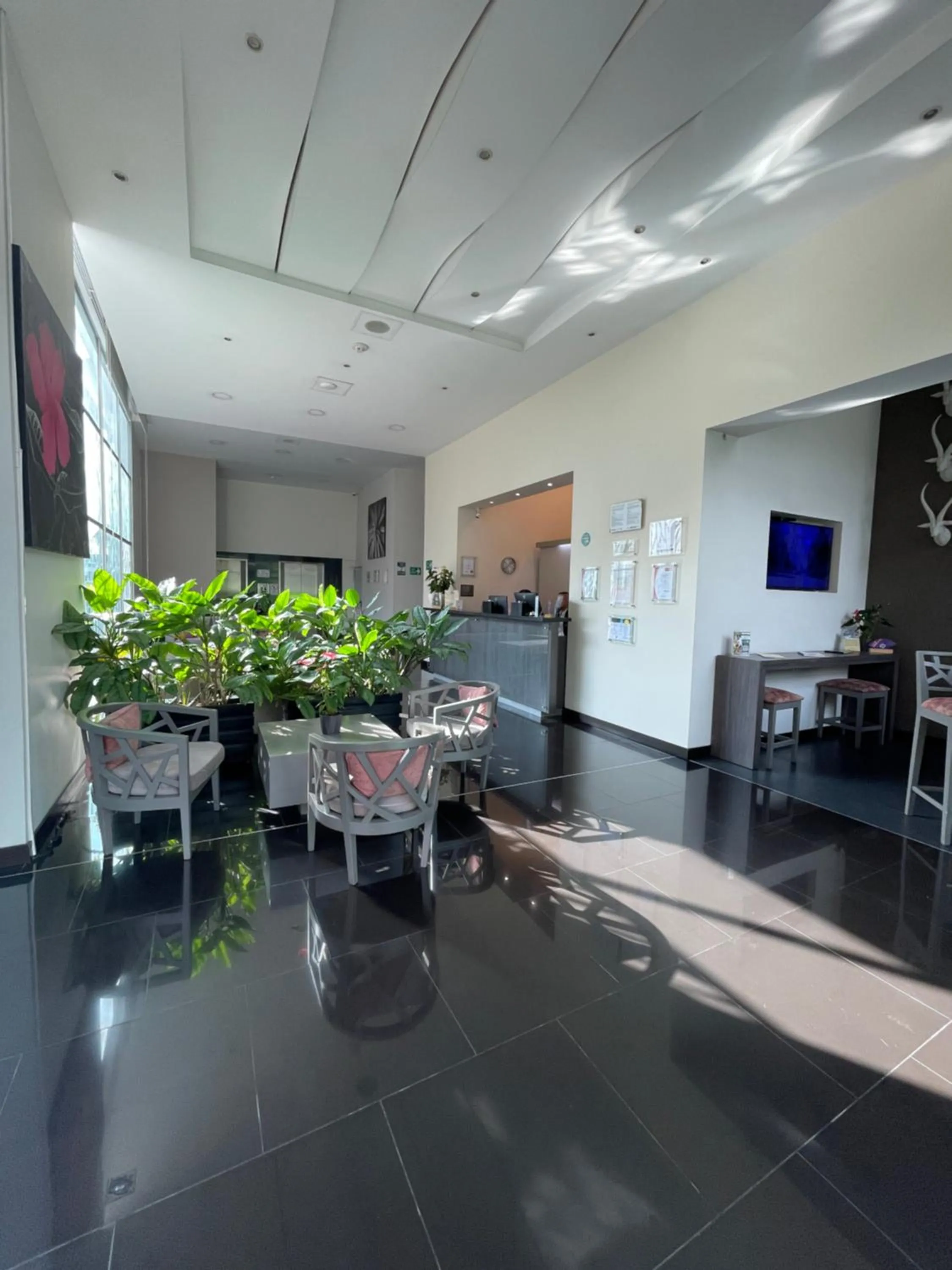 Lobby or reception in Hotel bh El Poblado