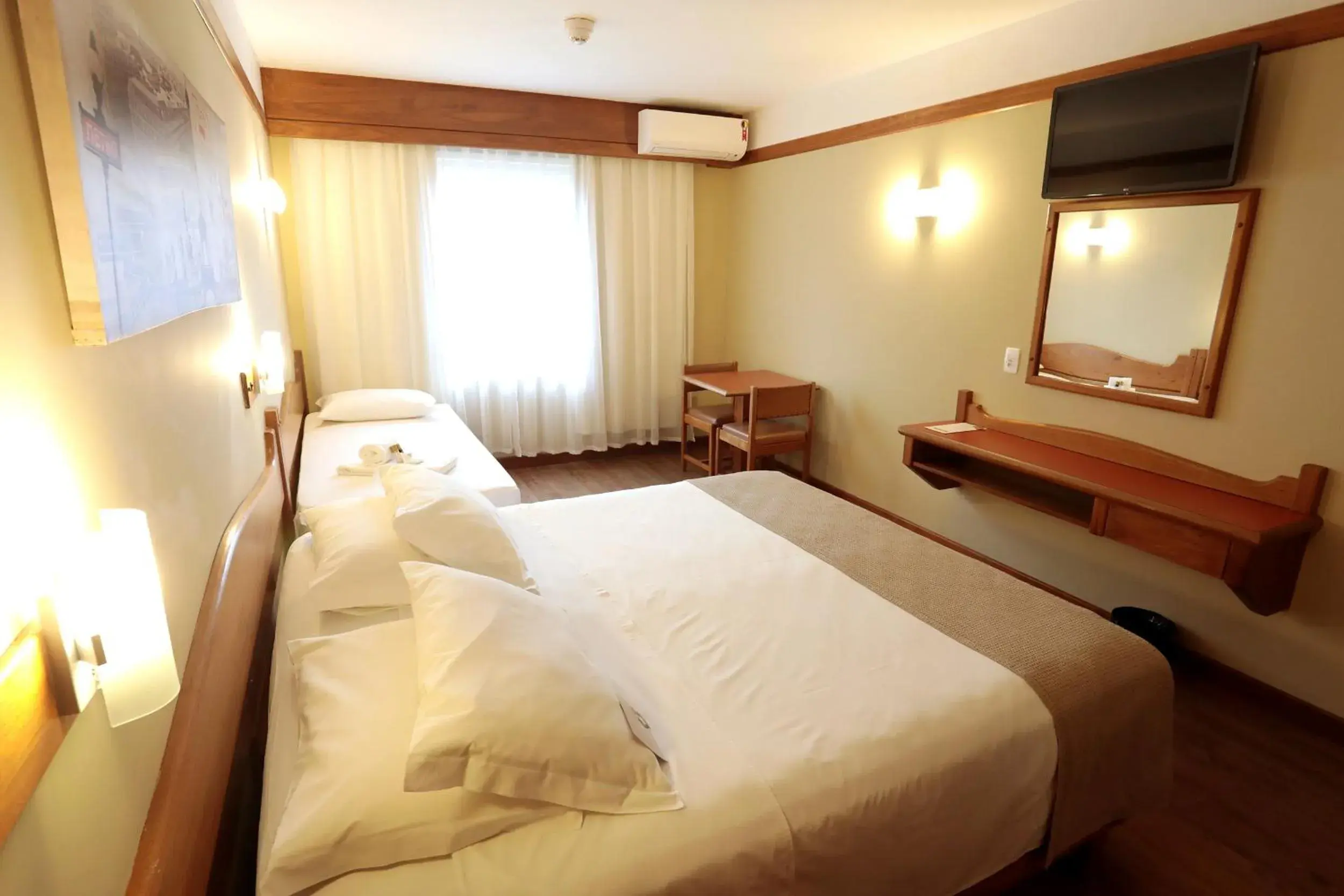 TV and multimedia, Bed in Tri Hotel TV and multimedia, Bed in Tri Hotel