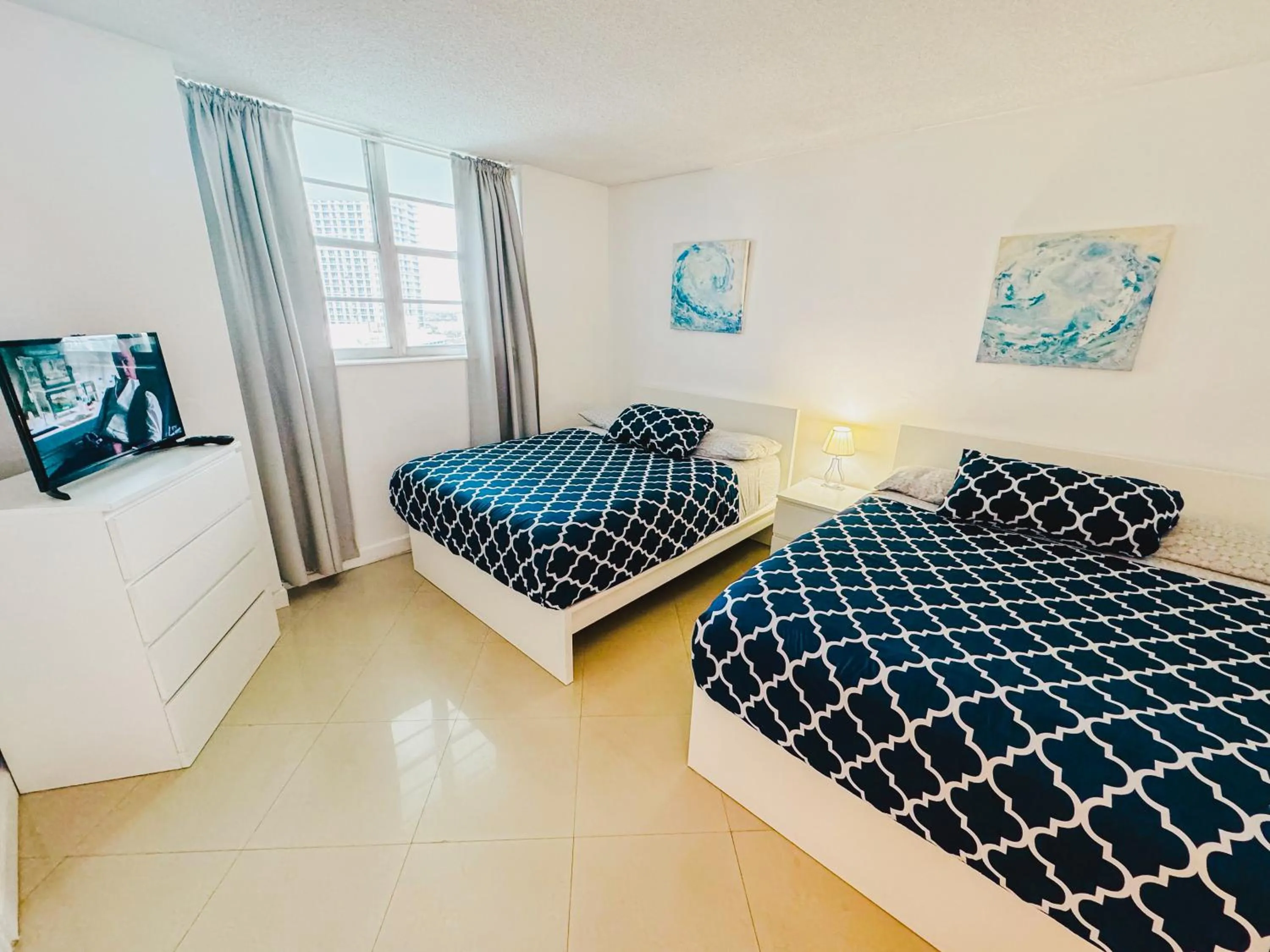Bed in Miami Hallandale Condo, Partial Ocean View Direct Beach and Pool Access Miami Hollywood Beach