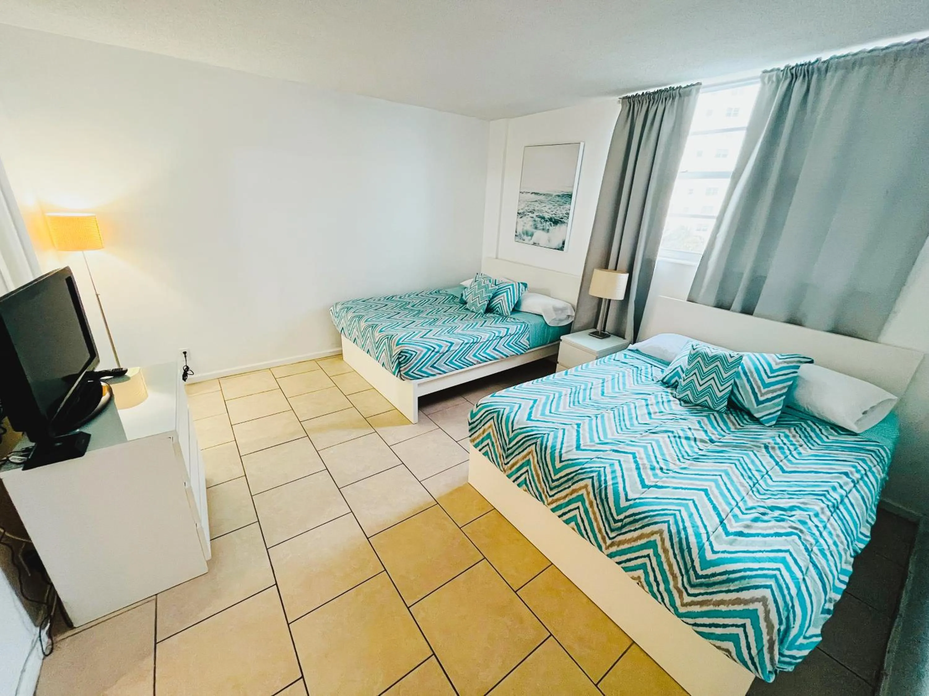 Bed in Miami Hallandale Condo, Partial Ocean View Direct Beach and Pool Access Miami Hollywood Beach