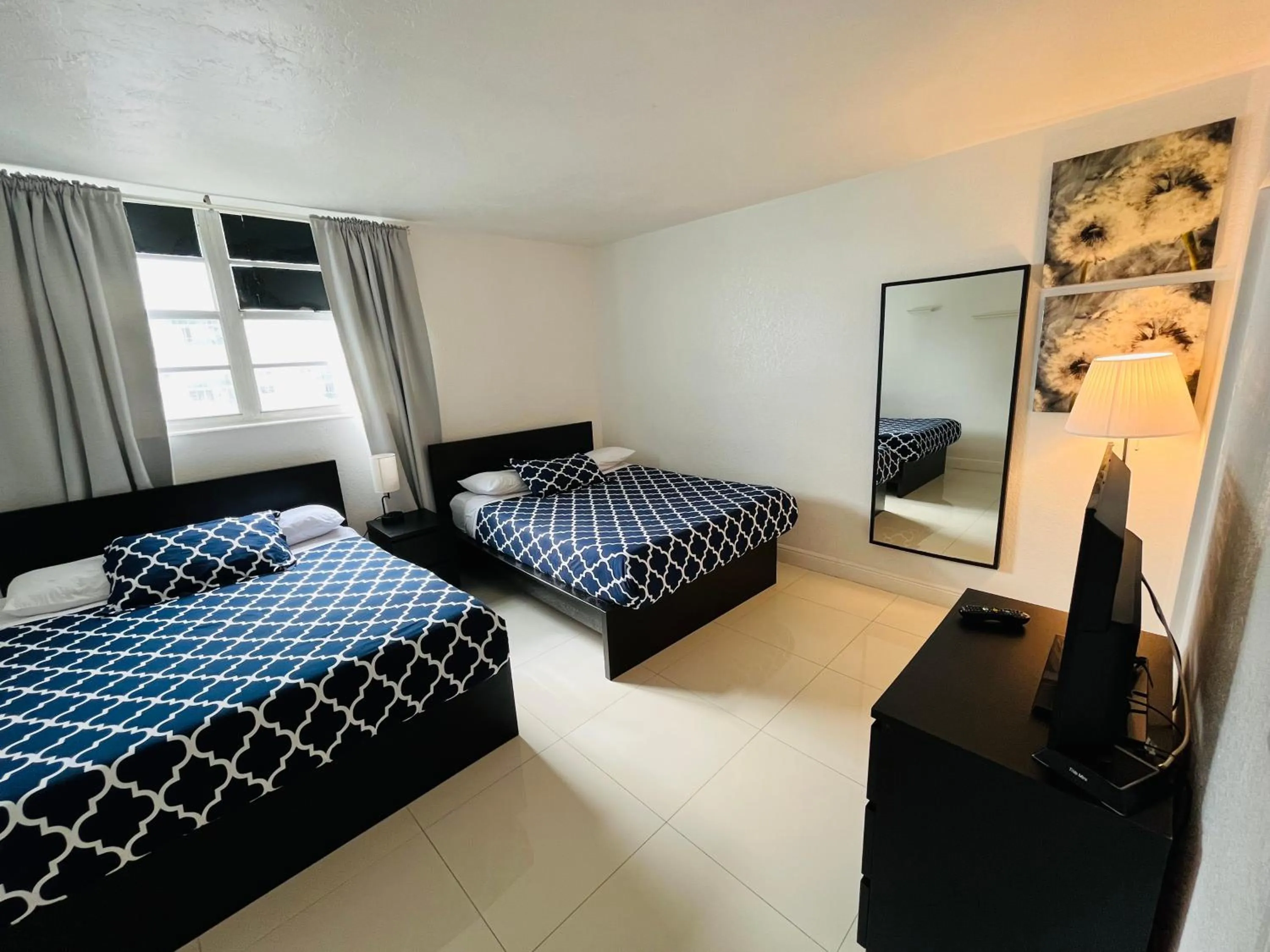 Bed in Miami Hallandale Condo, Partial Ocean View Direct Beach and Pool Access Miami Hollywood Beach