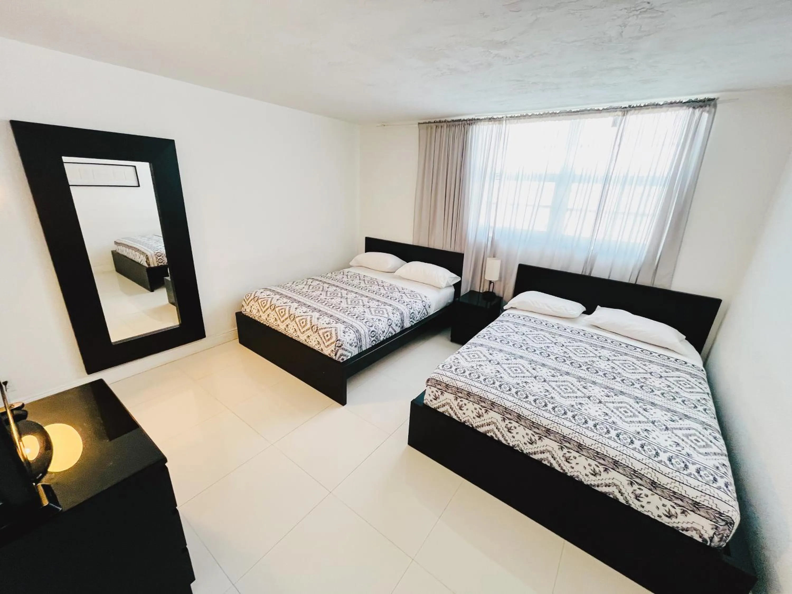 Bed in Miami Hallandale Condo, Partial Ocean View Direct Beach and Pool Access Miami Hollywood Beach