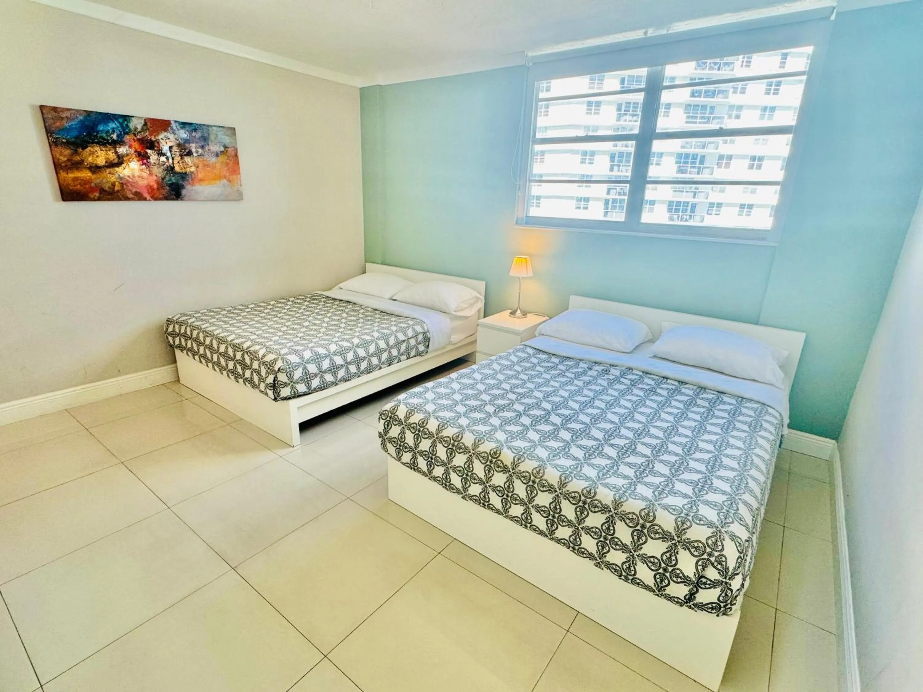 Bed in Miami Hallandale Condo, Partial Ocean View Direct Beach and Pool Access Miami Hollywood Beach