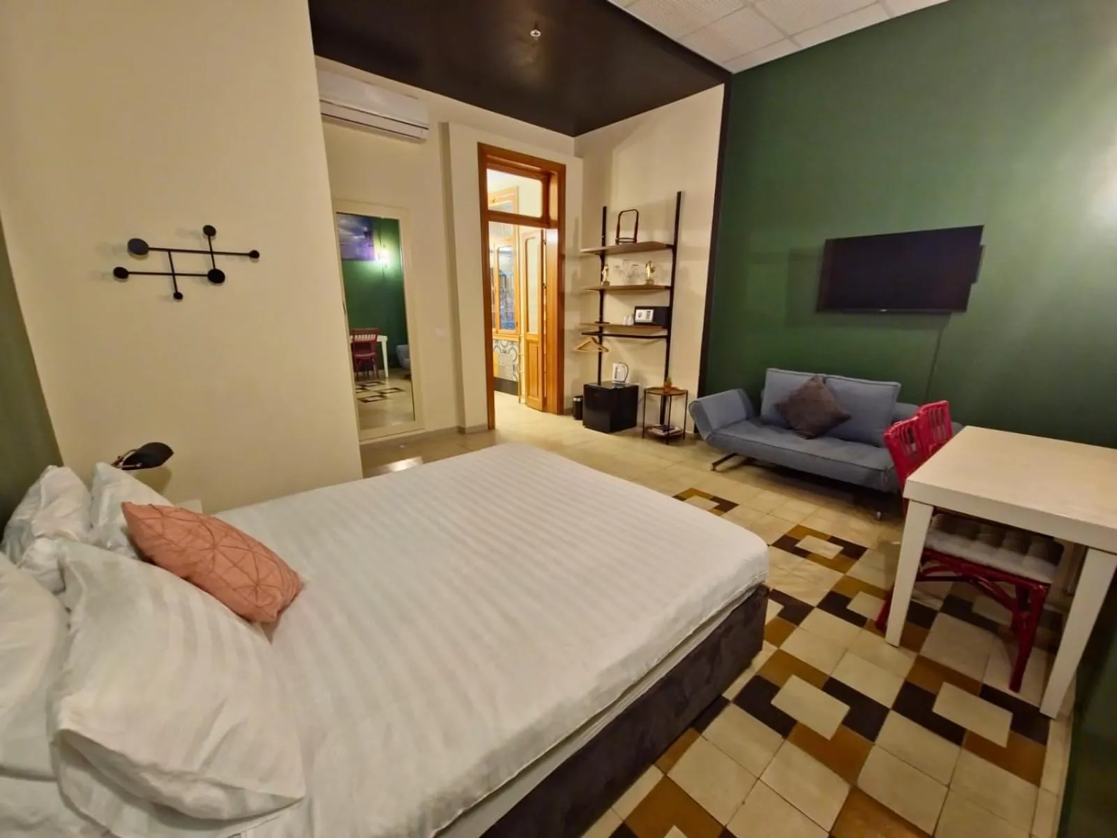 Living room, Bed in INTA Hotel