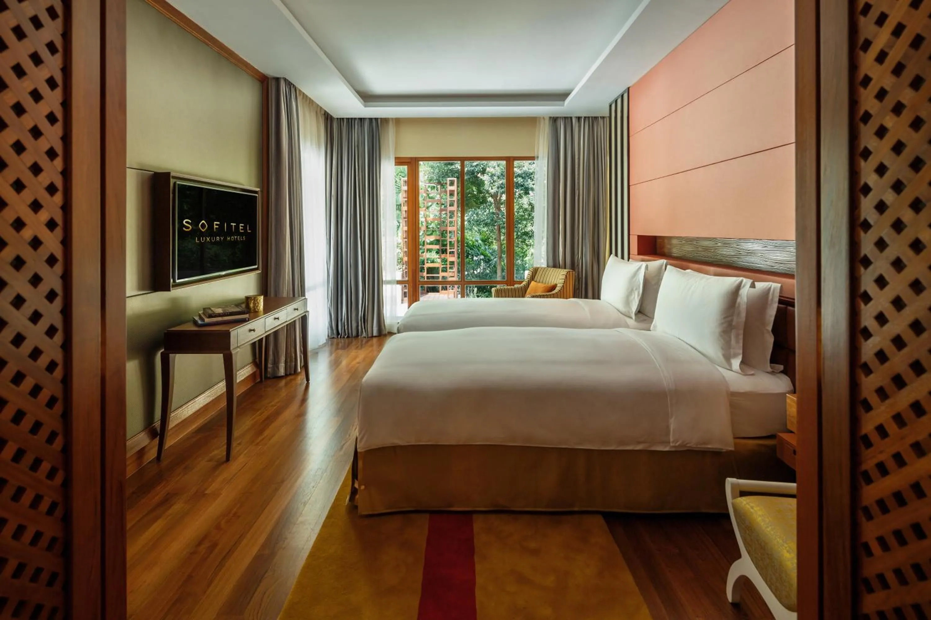 Photo of the whole room, Bed in Sofitel Singapore Sentosa