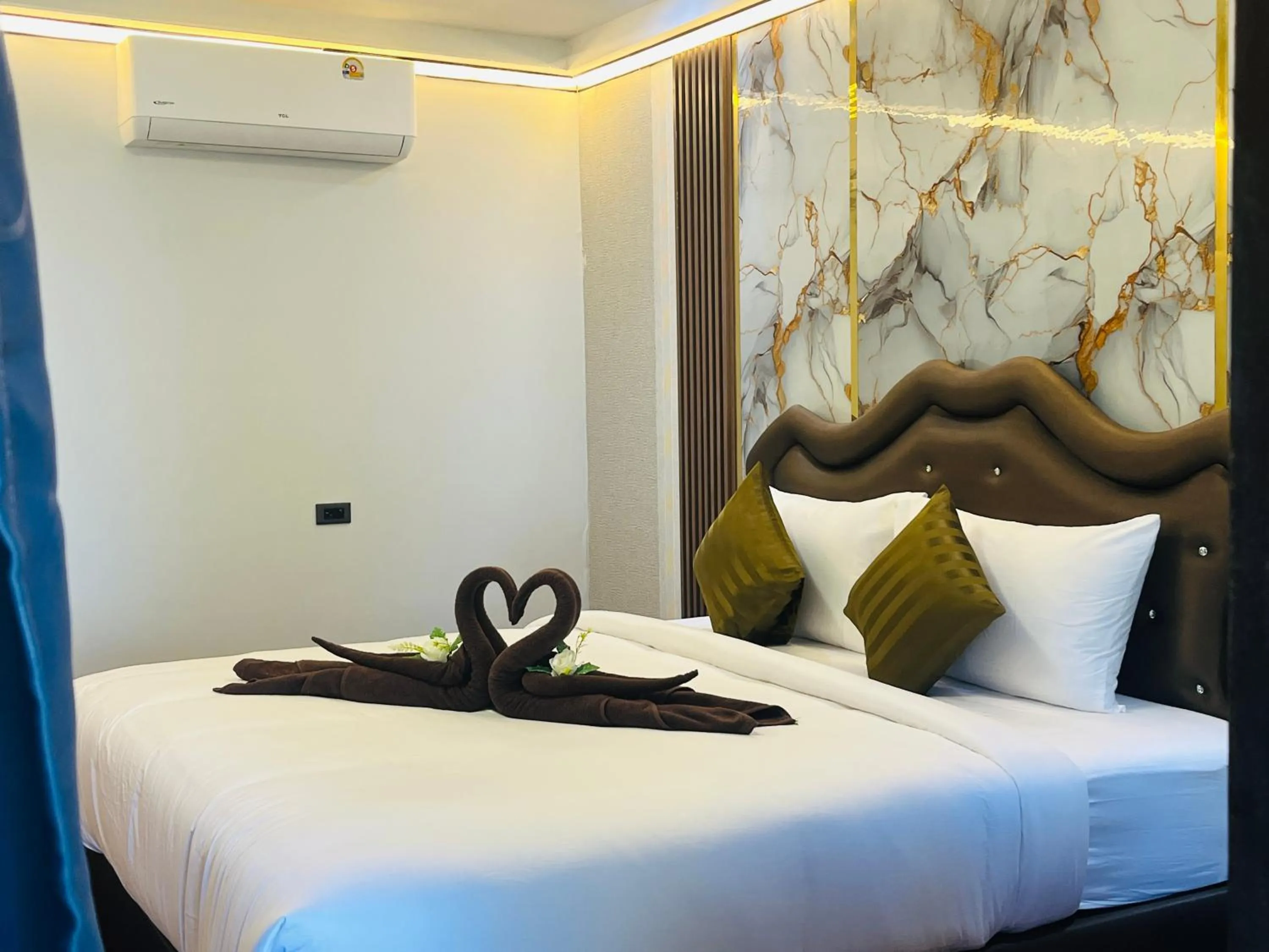 Bed in New Ozone Resort & Spa