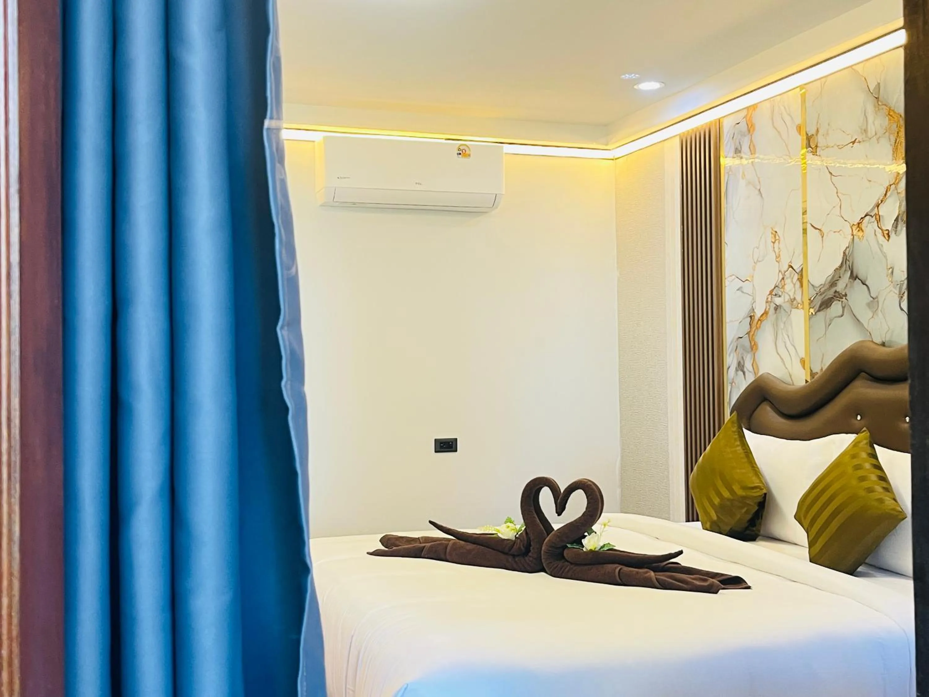 Bed in New Ozone Resort & Spa