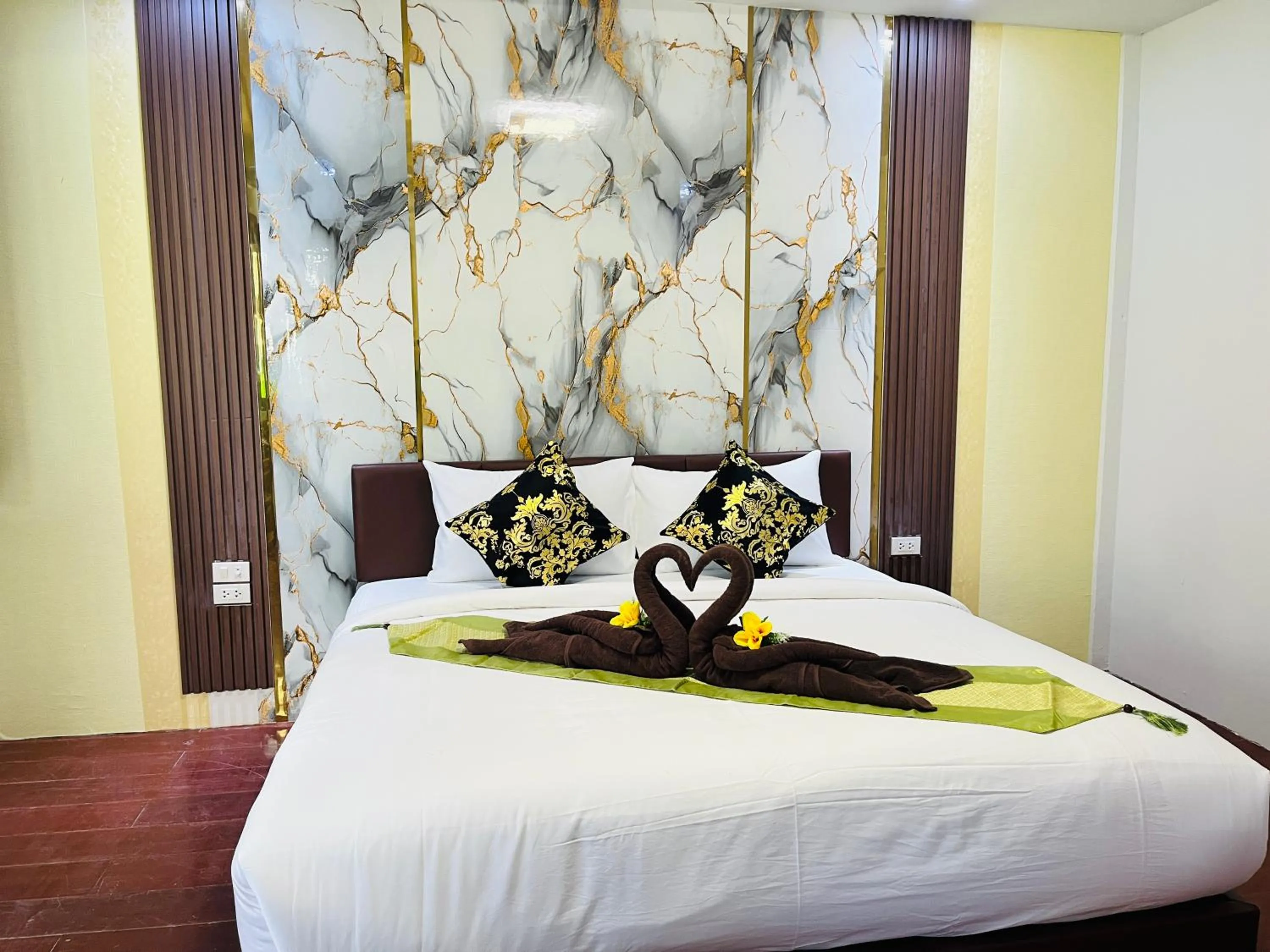 Bed in New Ozone Resort & Spa