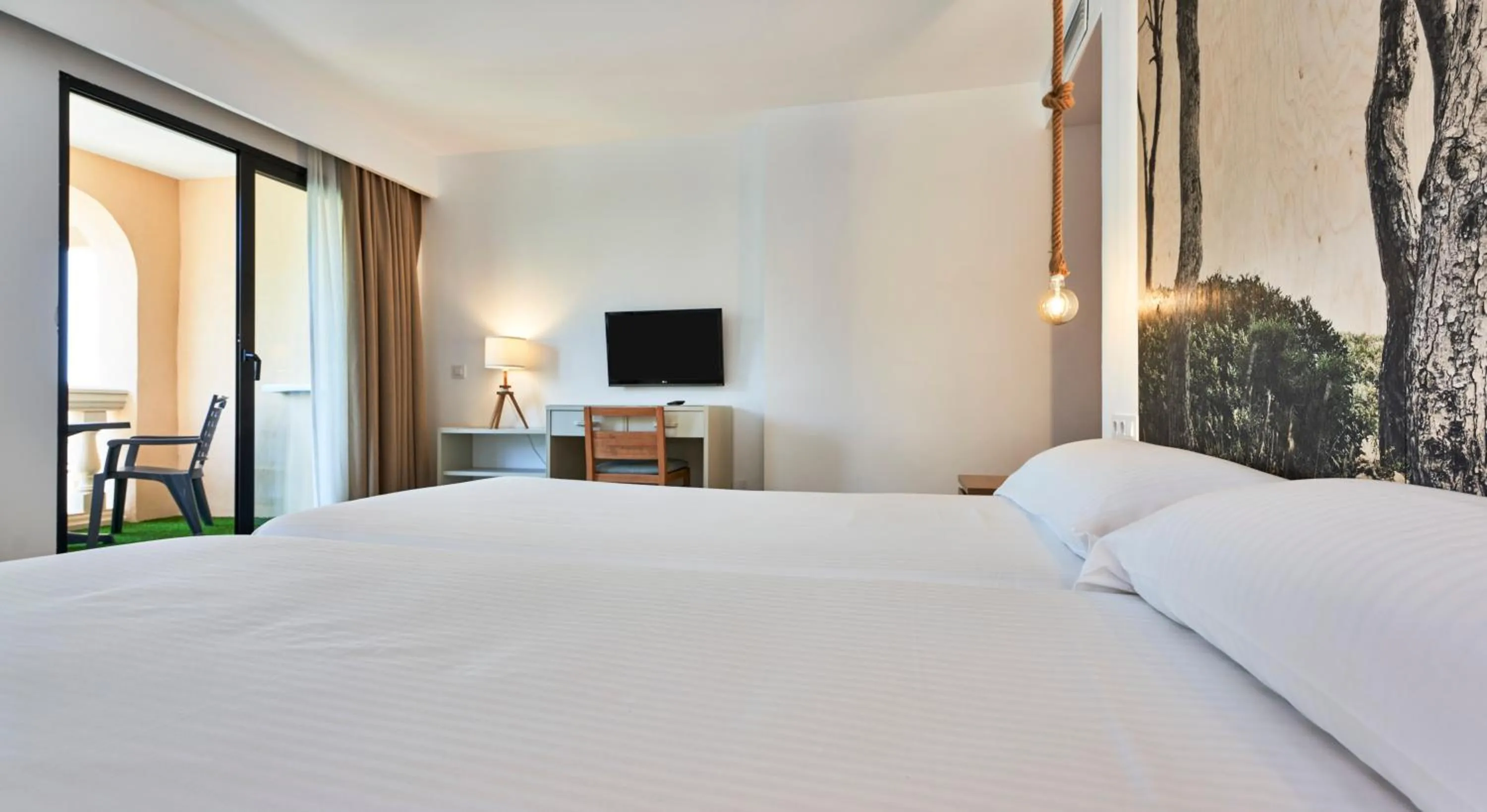 Bed in Apartamentos S'Olivera