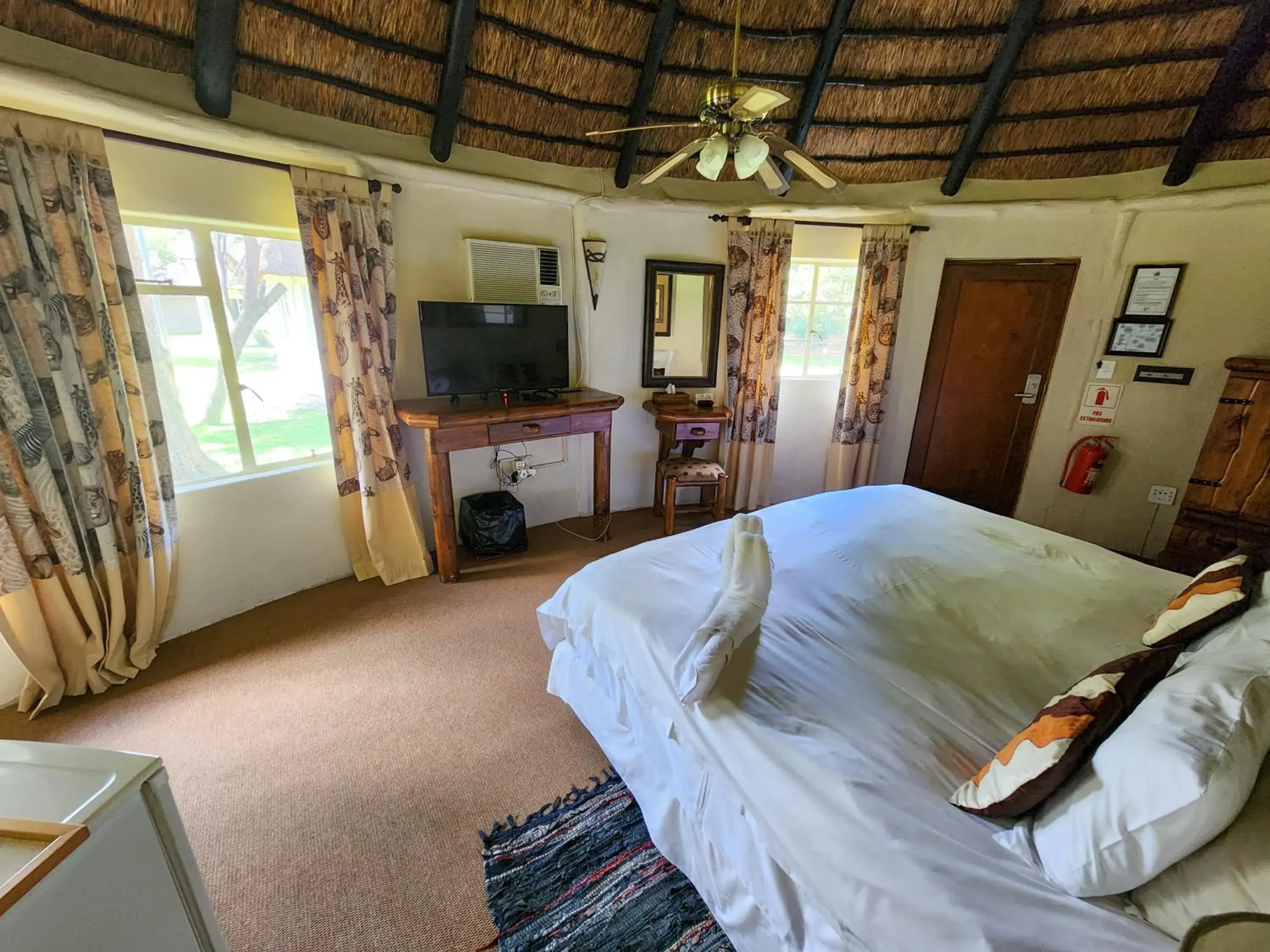 Communal lounge/ TV room, Bed in Ditholo Game Lodge Bela Bela Communal lounge/ TV room, Bed in Ditholo Game Lodge Bela Bela