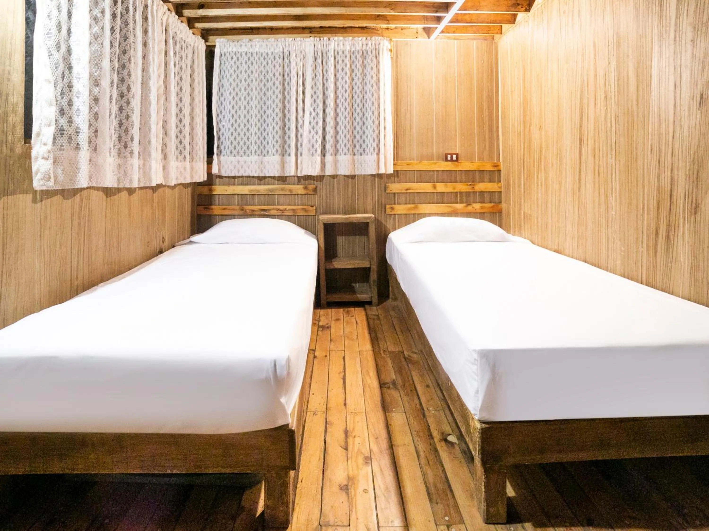 Photo of the whole room, Bed in La Cabaña Del Tata