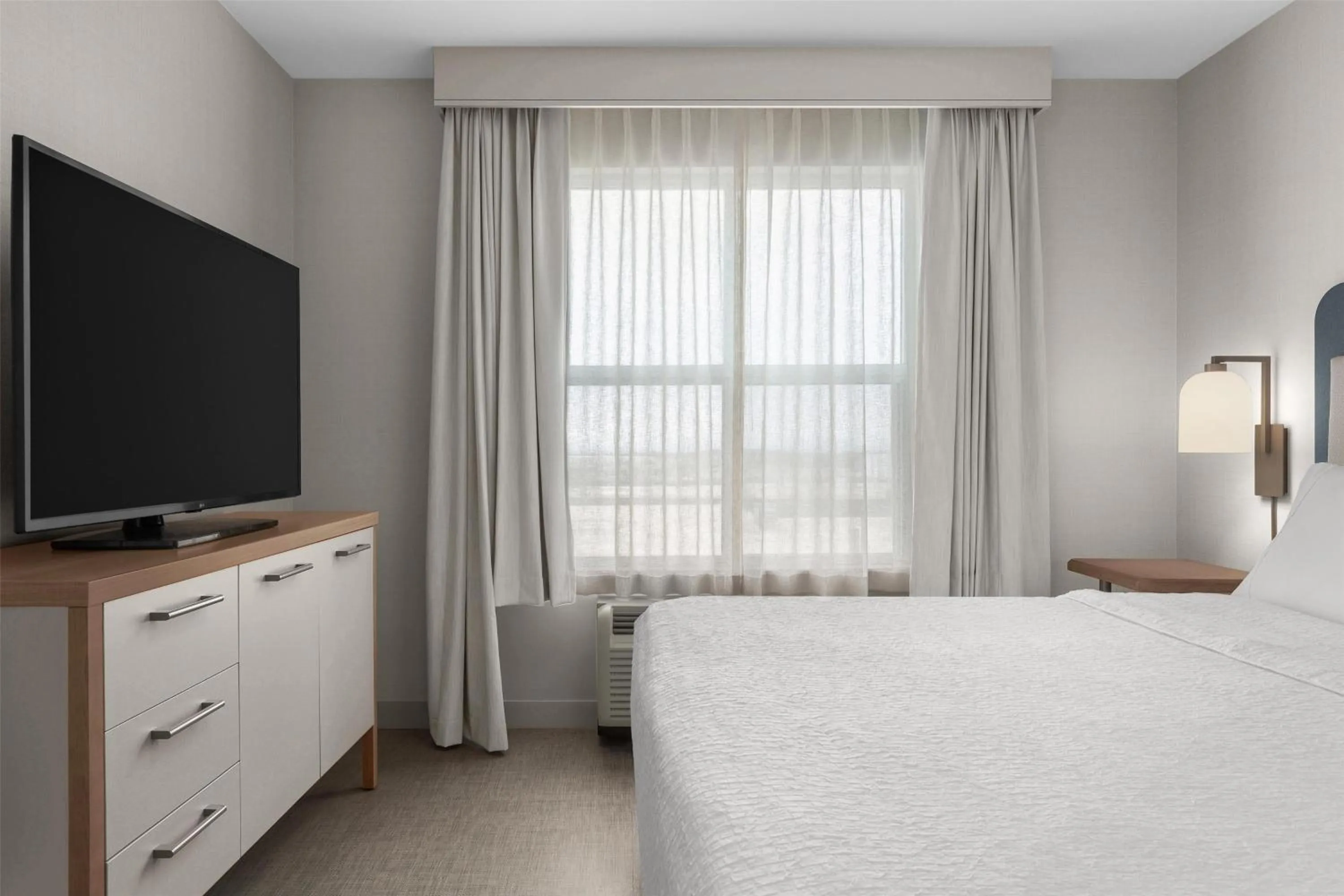 Bed in Homewood Suites by Hilton Burlington