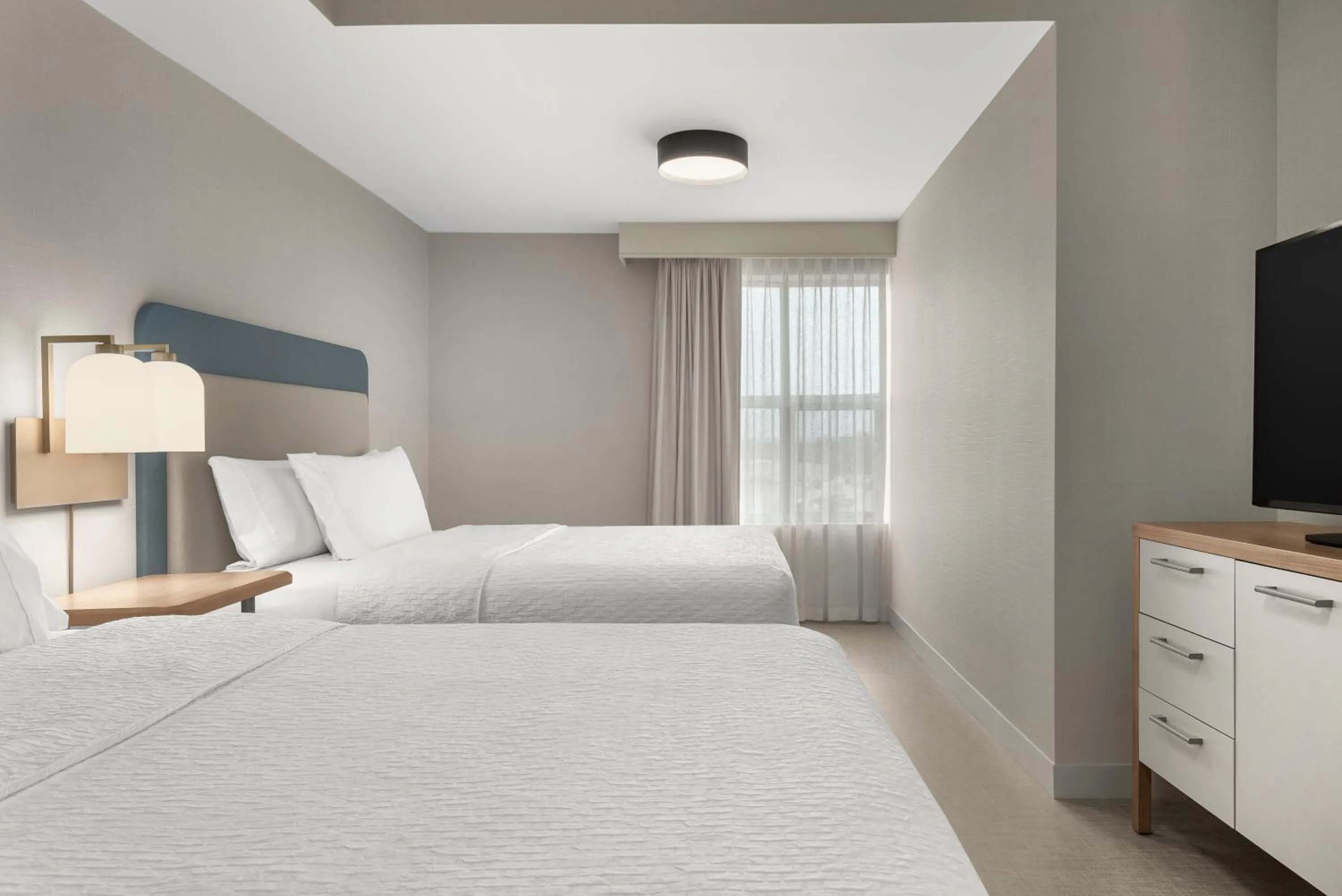 Bed in Homewood Suites by Hilton Burlington