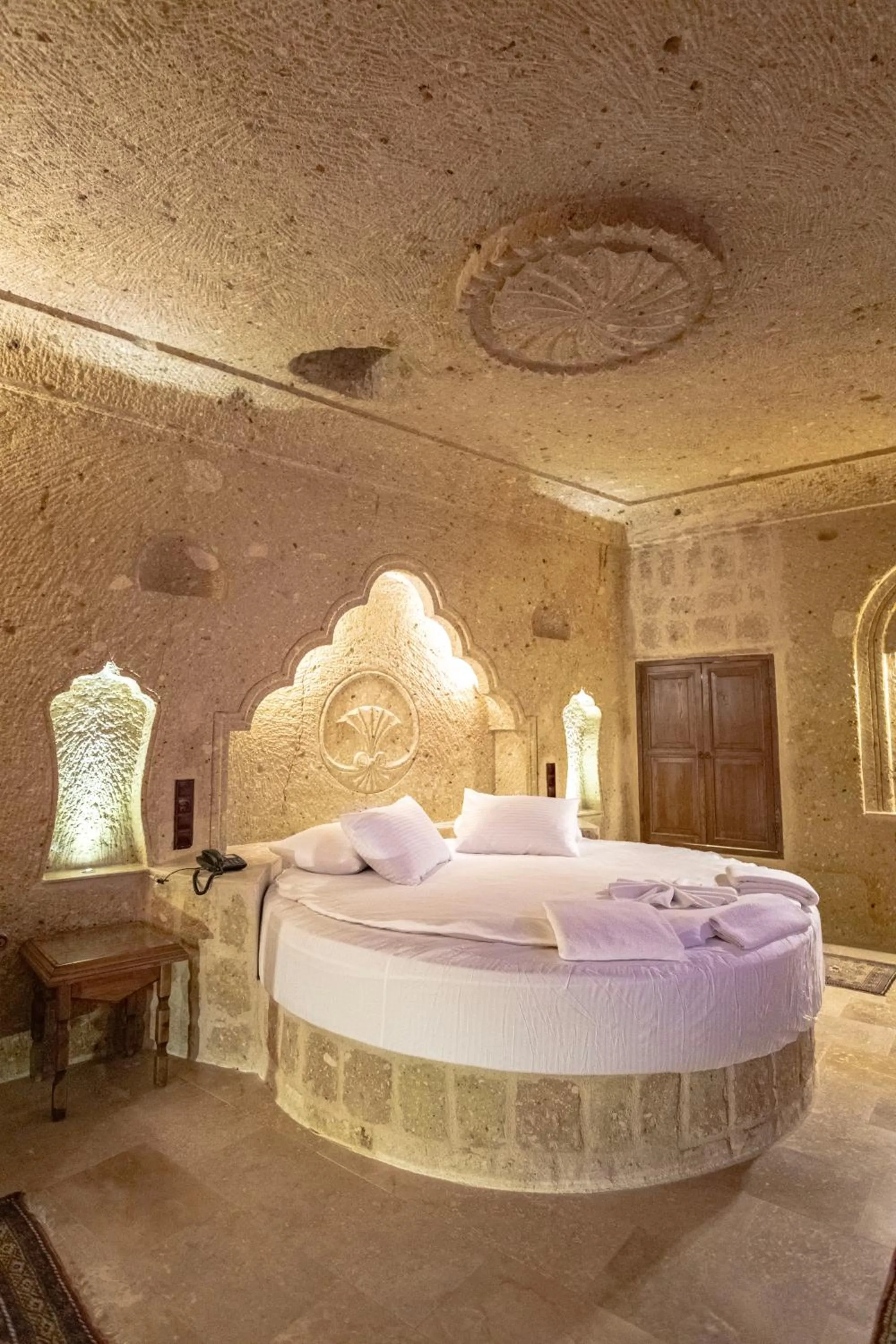 Bed in Kemerhan Cave Suites