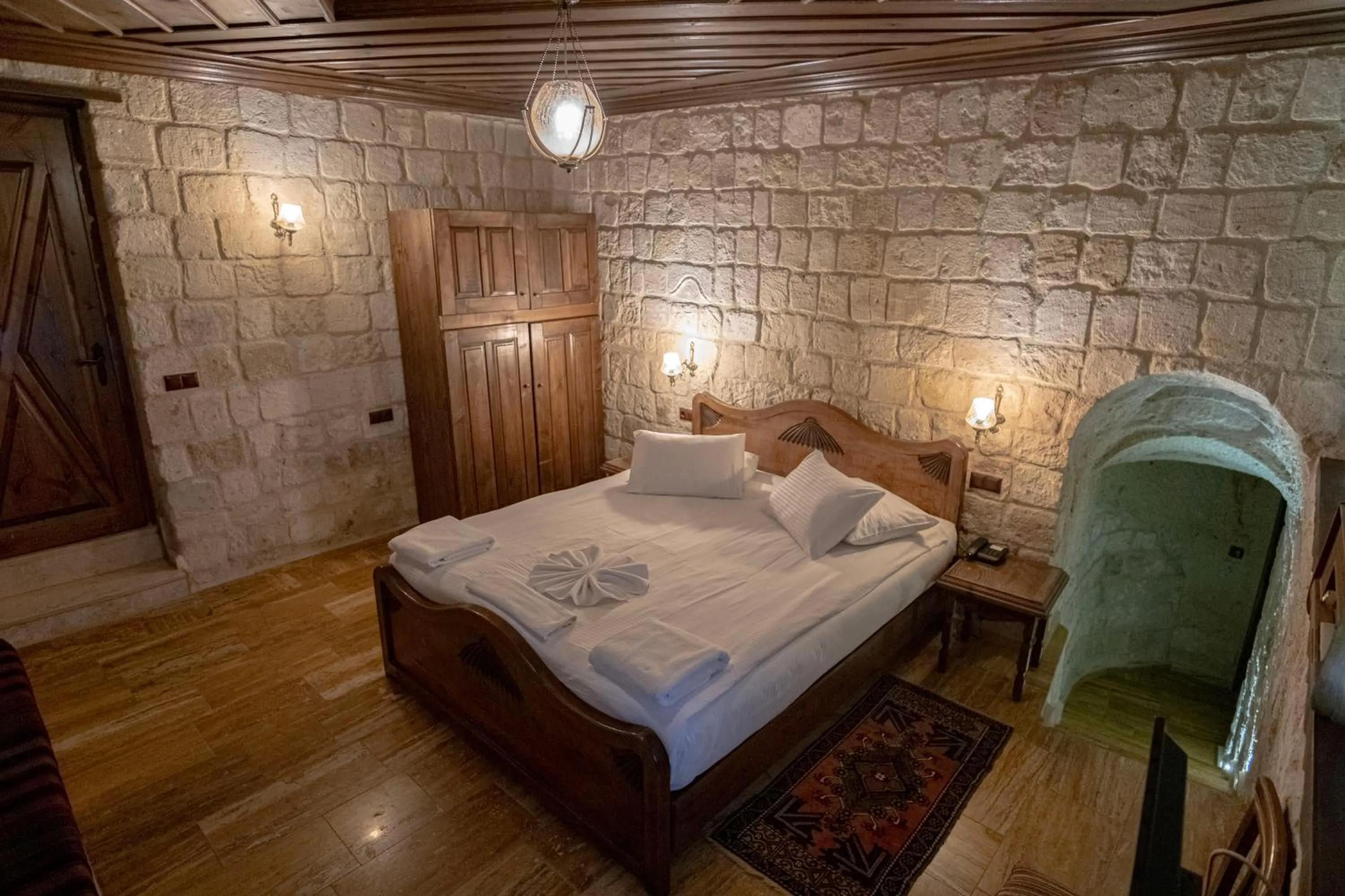 Bed in Kemerhan Cave Suites