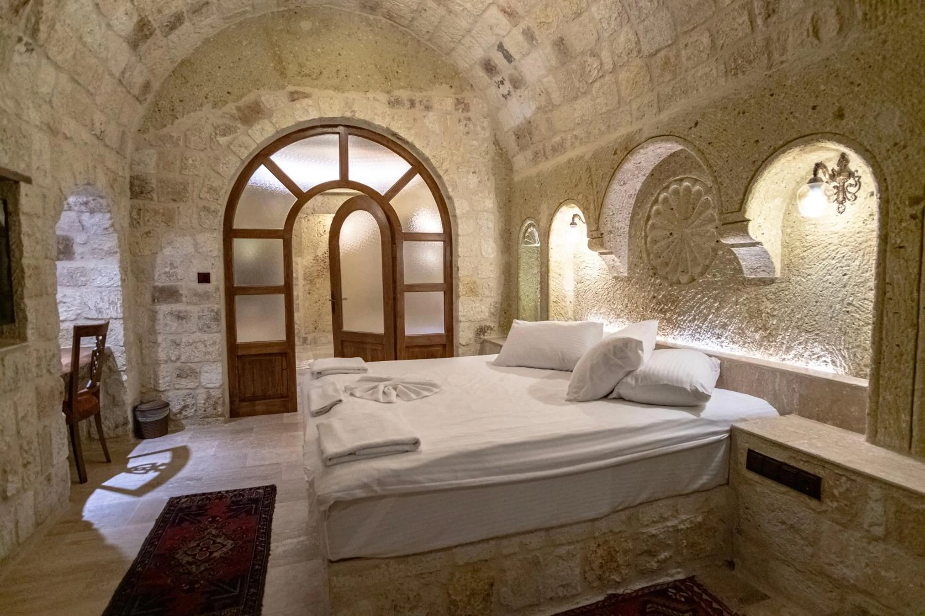 Bed in Kemerhan Cave Suites