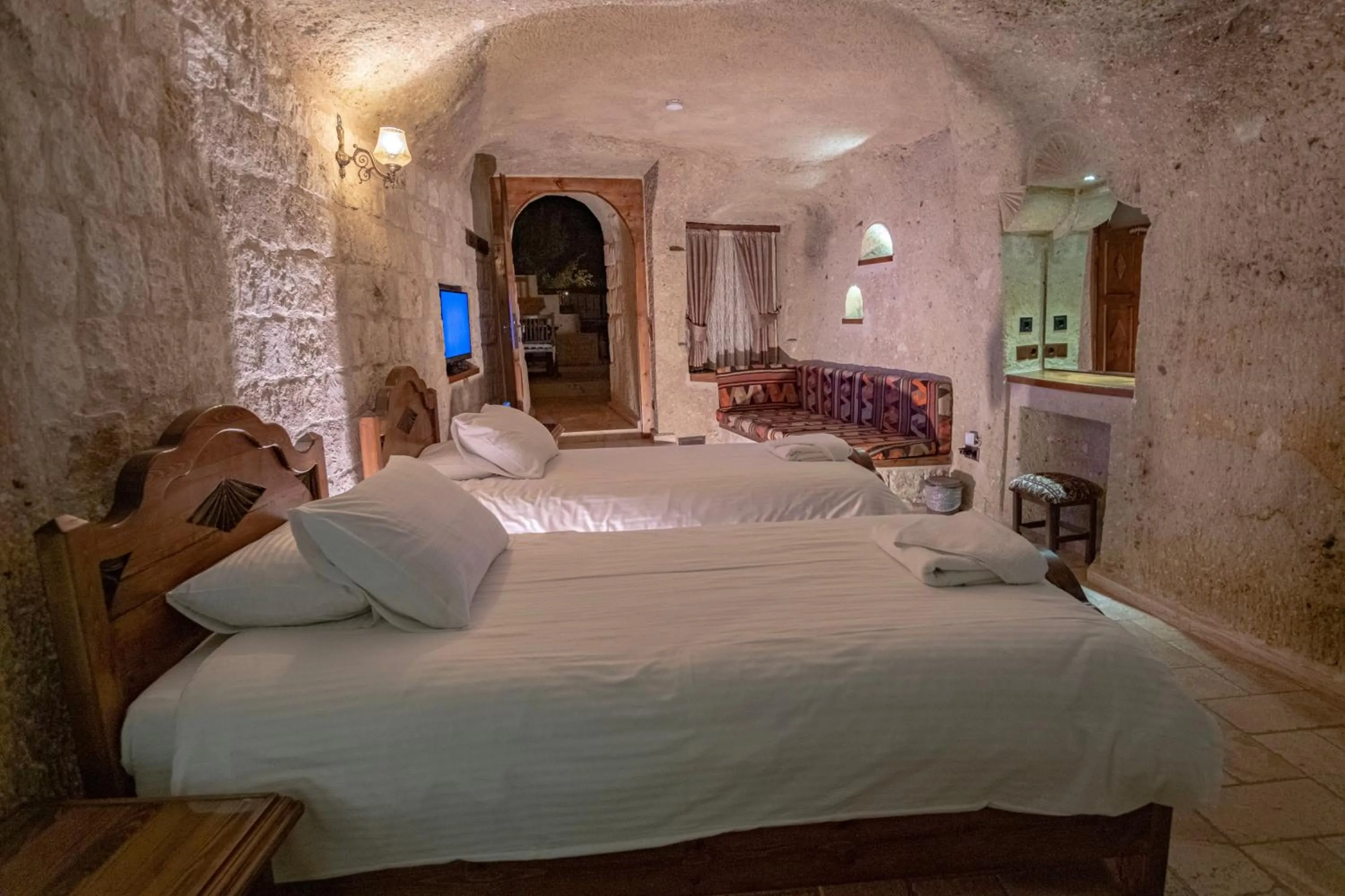 Bed in Kemerhan Cave Suites