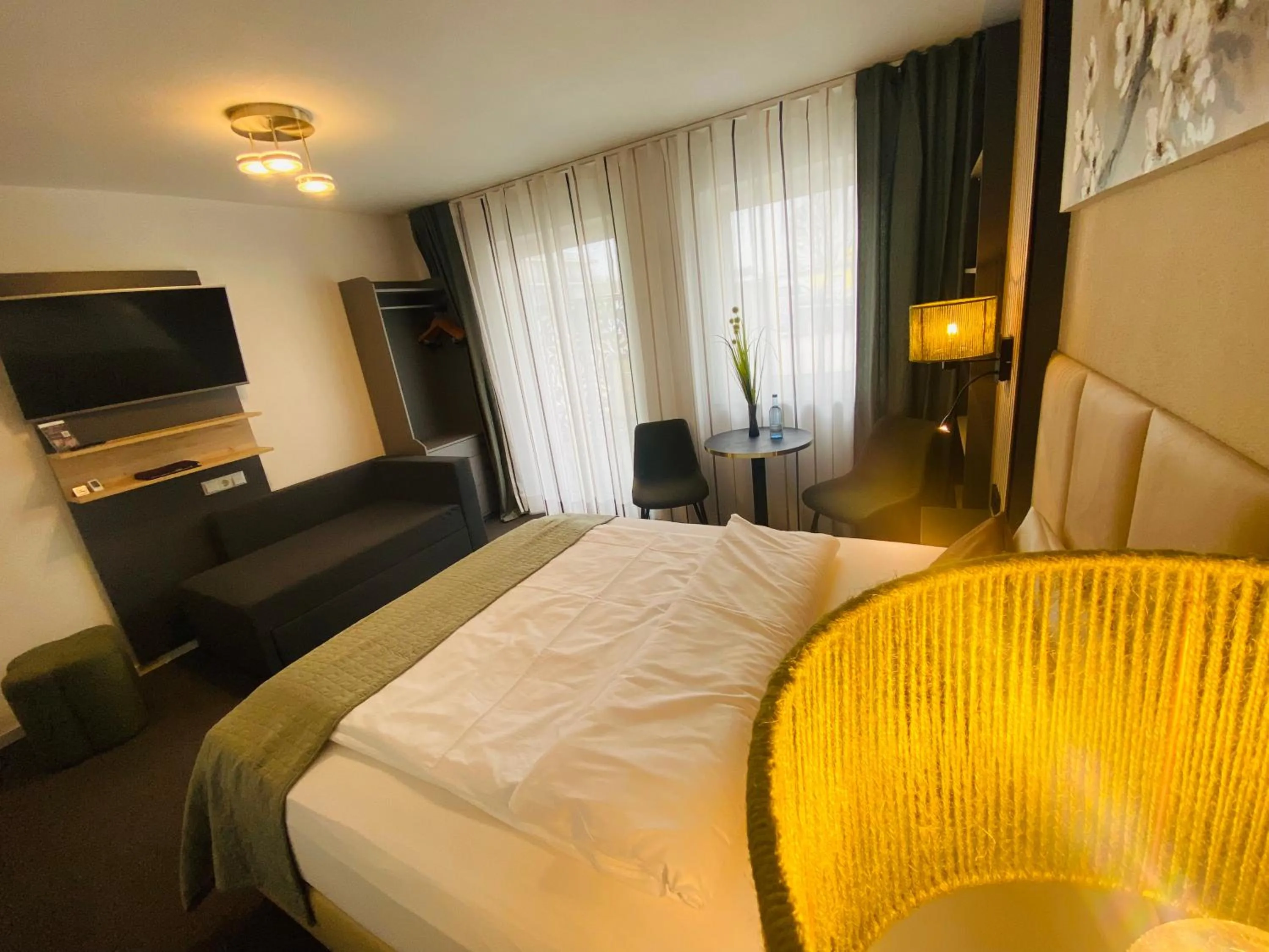 Bed in Apartments Amtzell, Selbst-Check-in