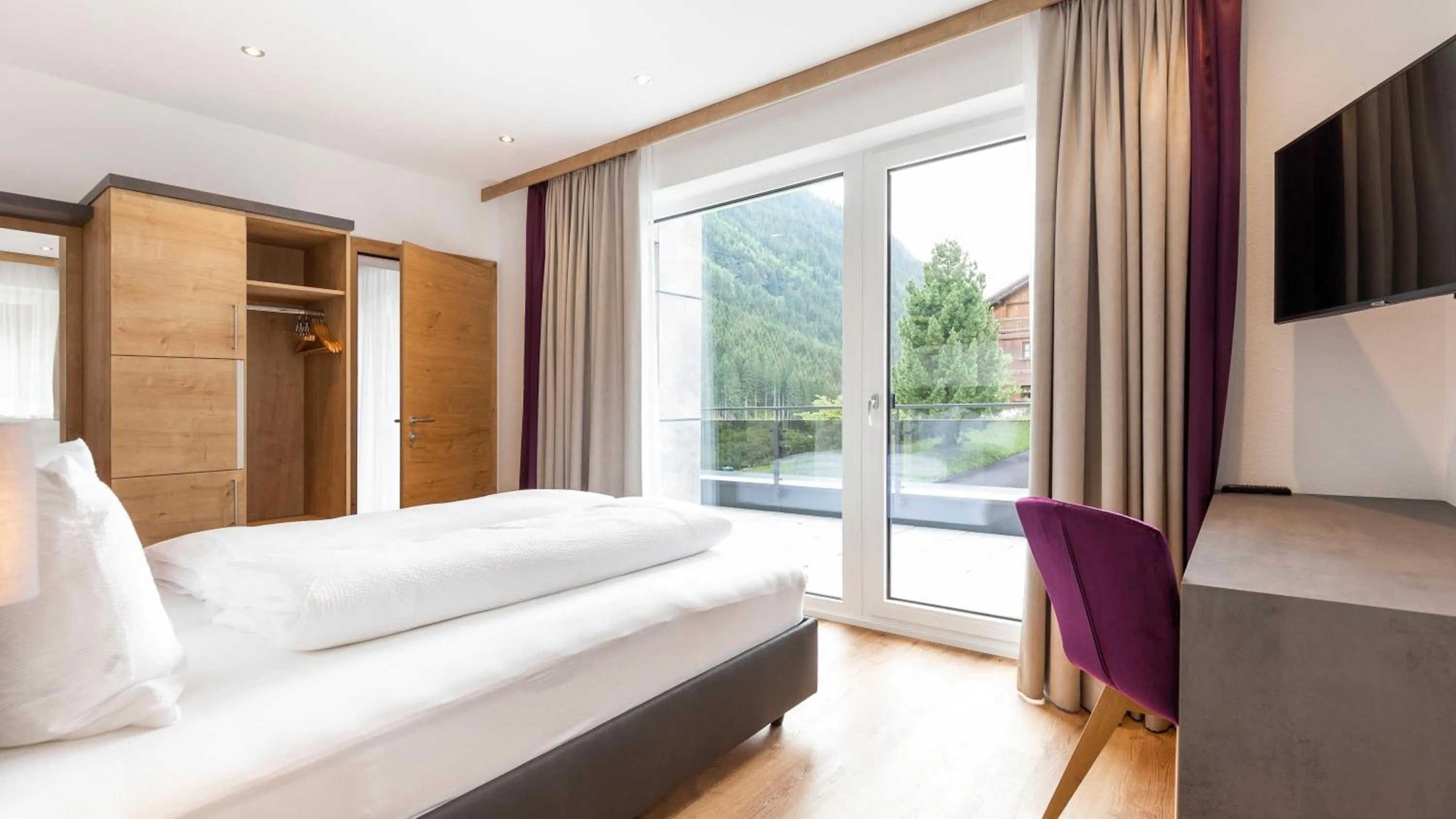 Bed in Aparthotel Lerch