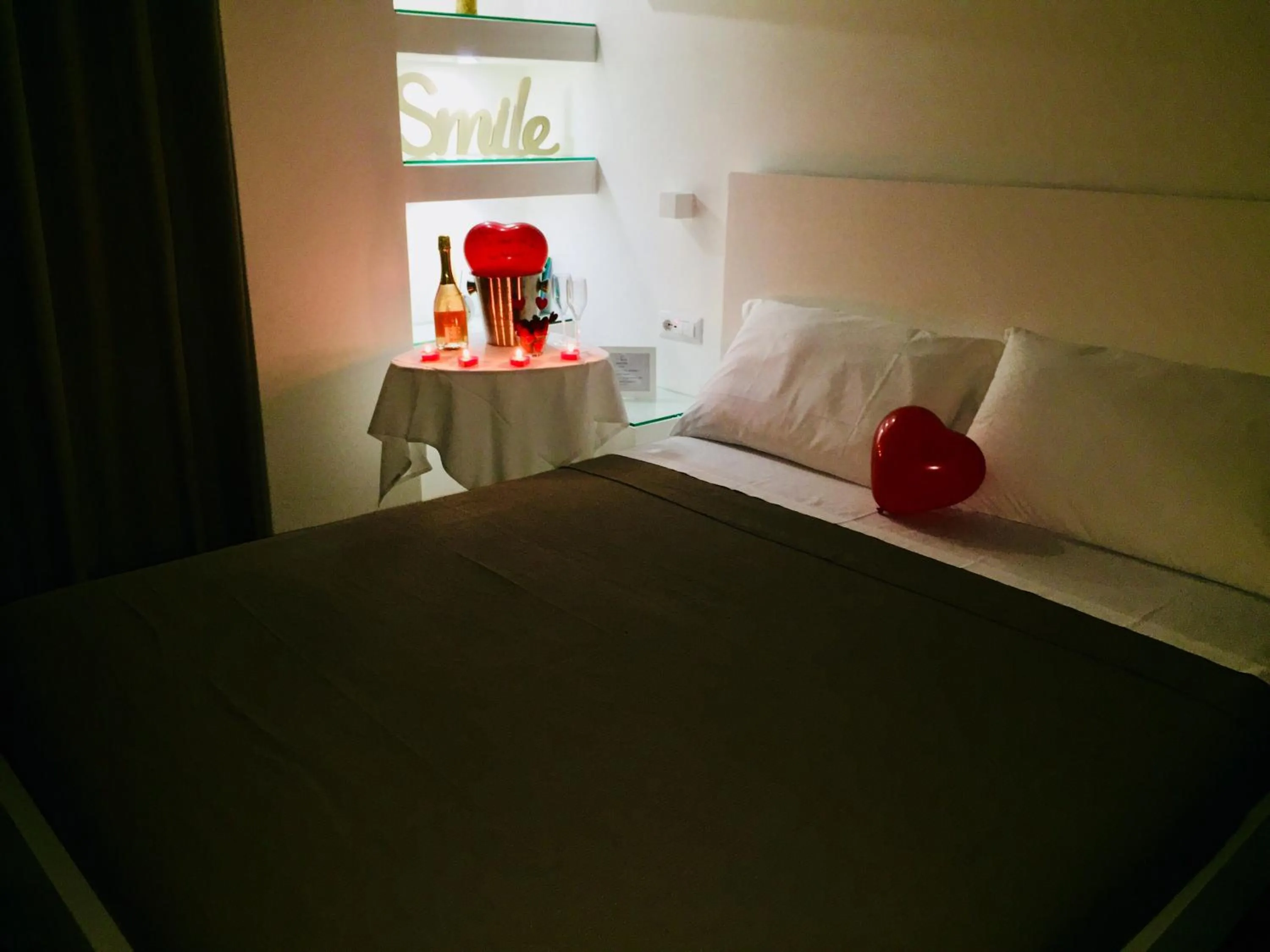 Bed in VILLA ADELAIDE SUITE & ROOM