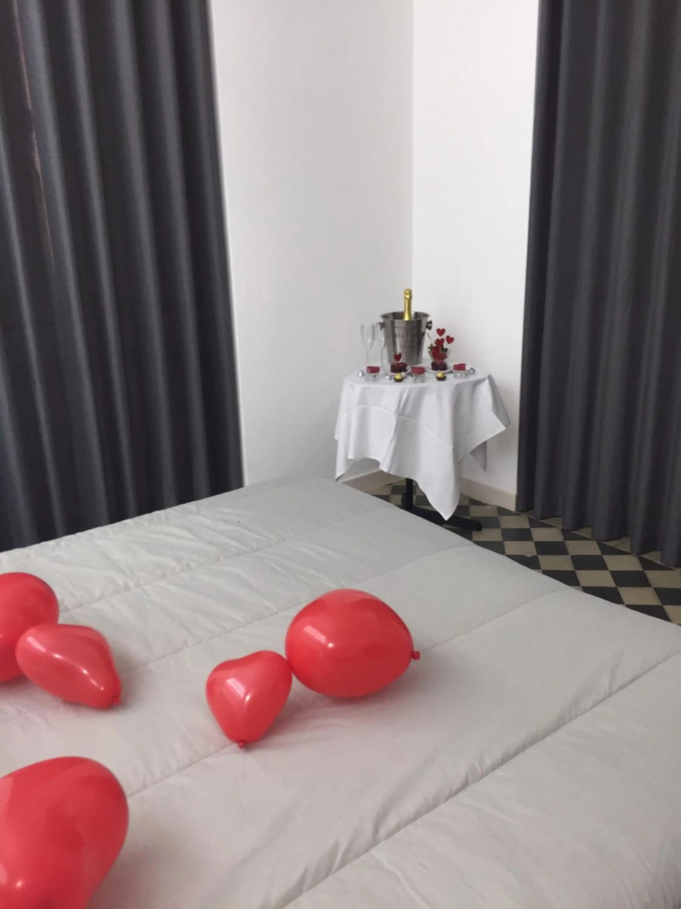 Bed in VILLA ADELAIDE SUITE & ROOM