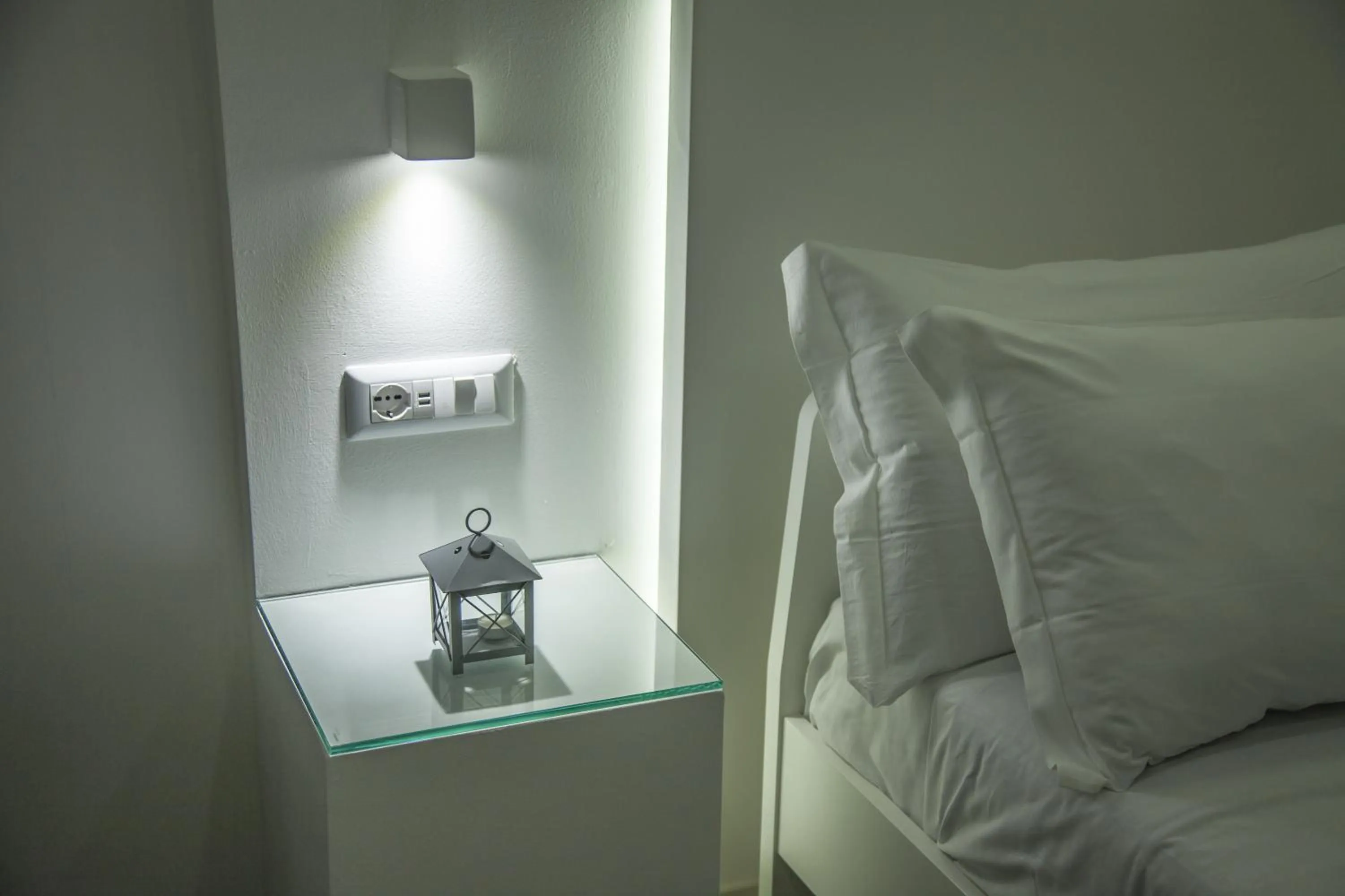 Bed in VILLA ADELAIDE SUITE & ROOM