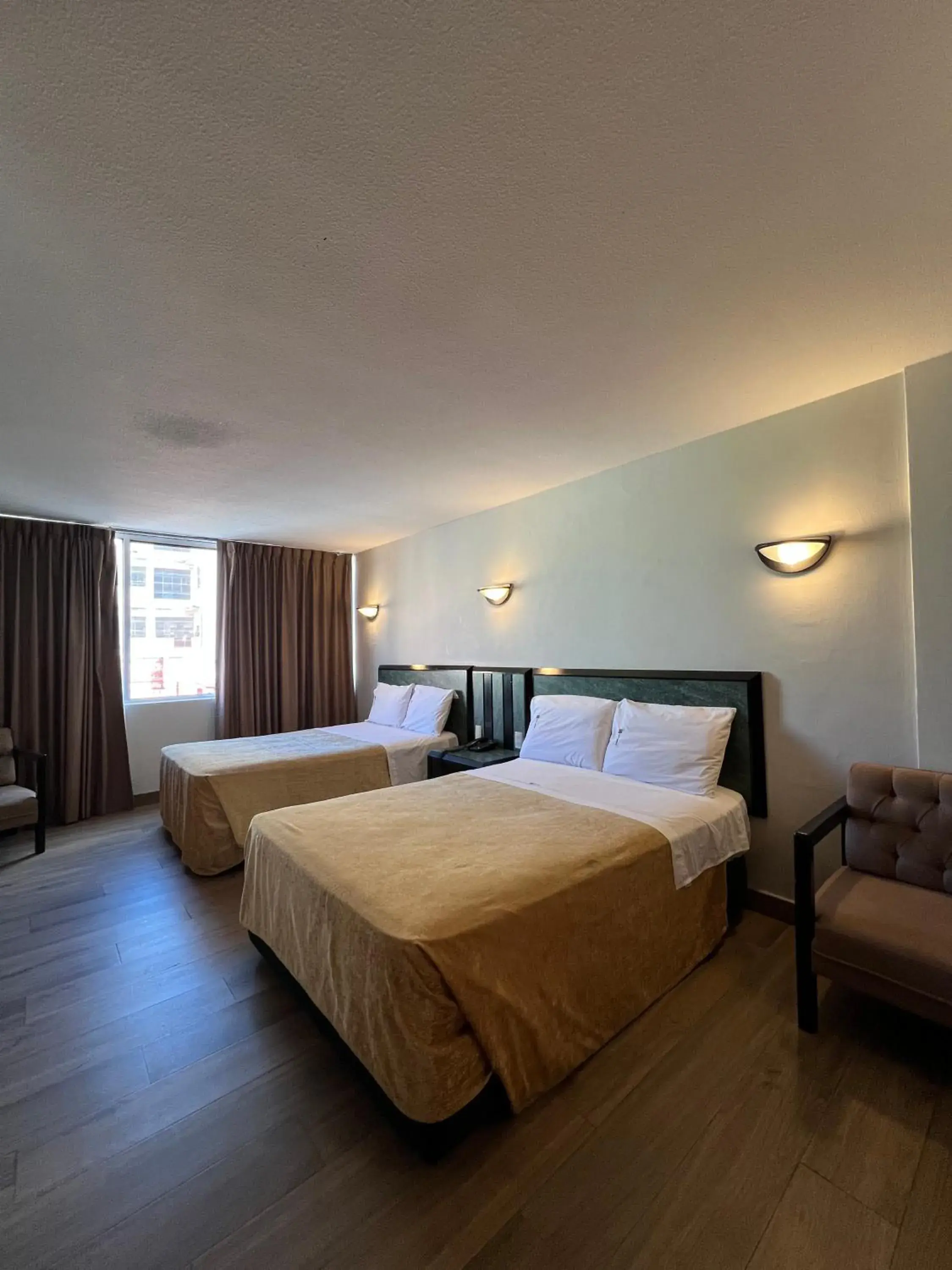 Bed in Hotel Universo Bed in Hotel Universo