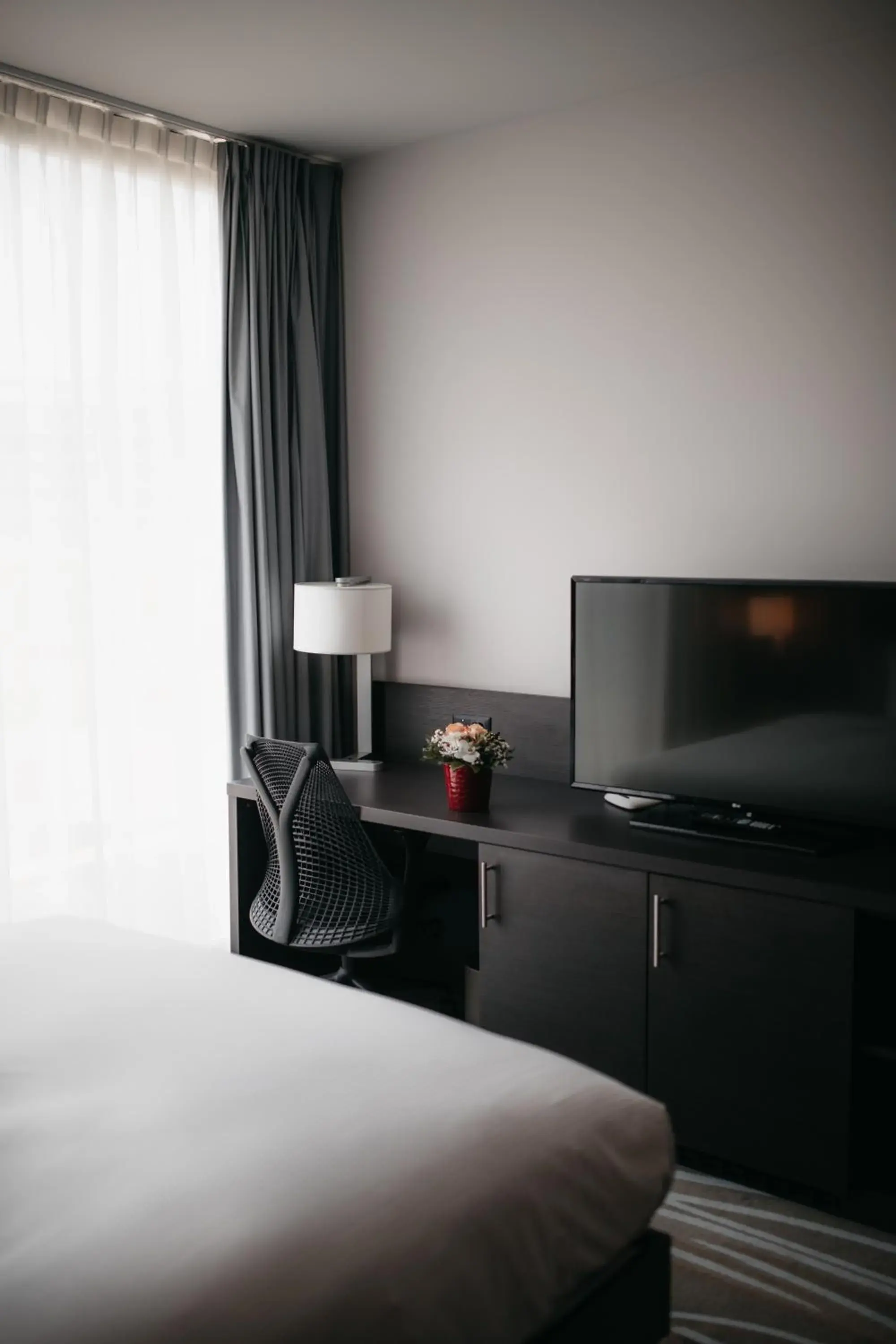 TV and multimedia, Bed in IIP Apartments - Self Check-In TV and multimedia, Bed in IIP Apartments - Self Check-In