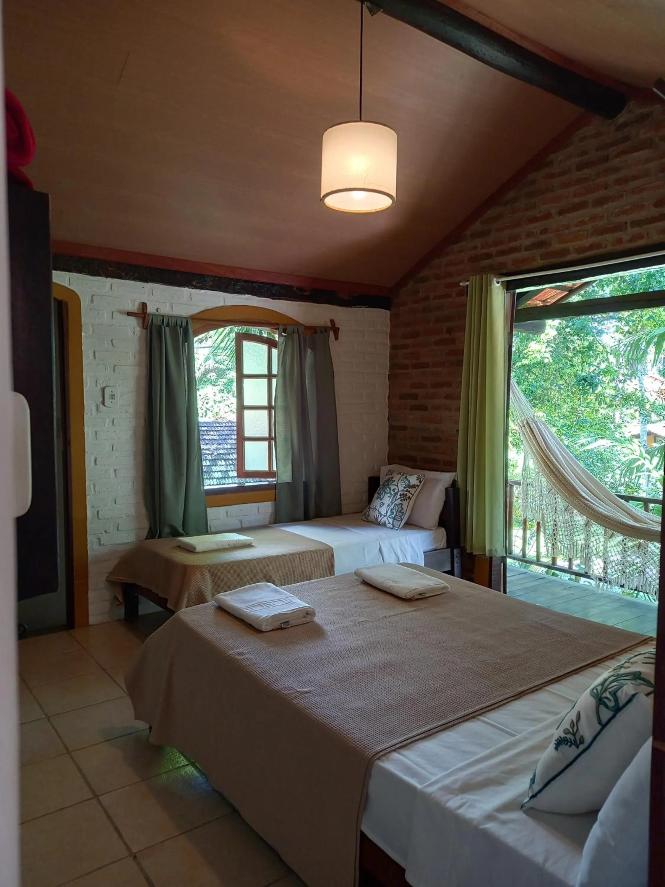 Bed in Pousada Atlântida