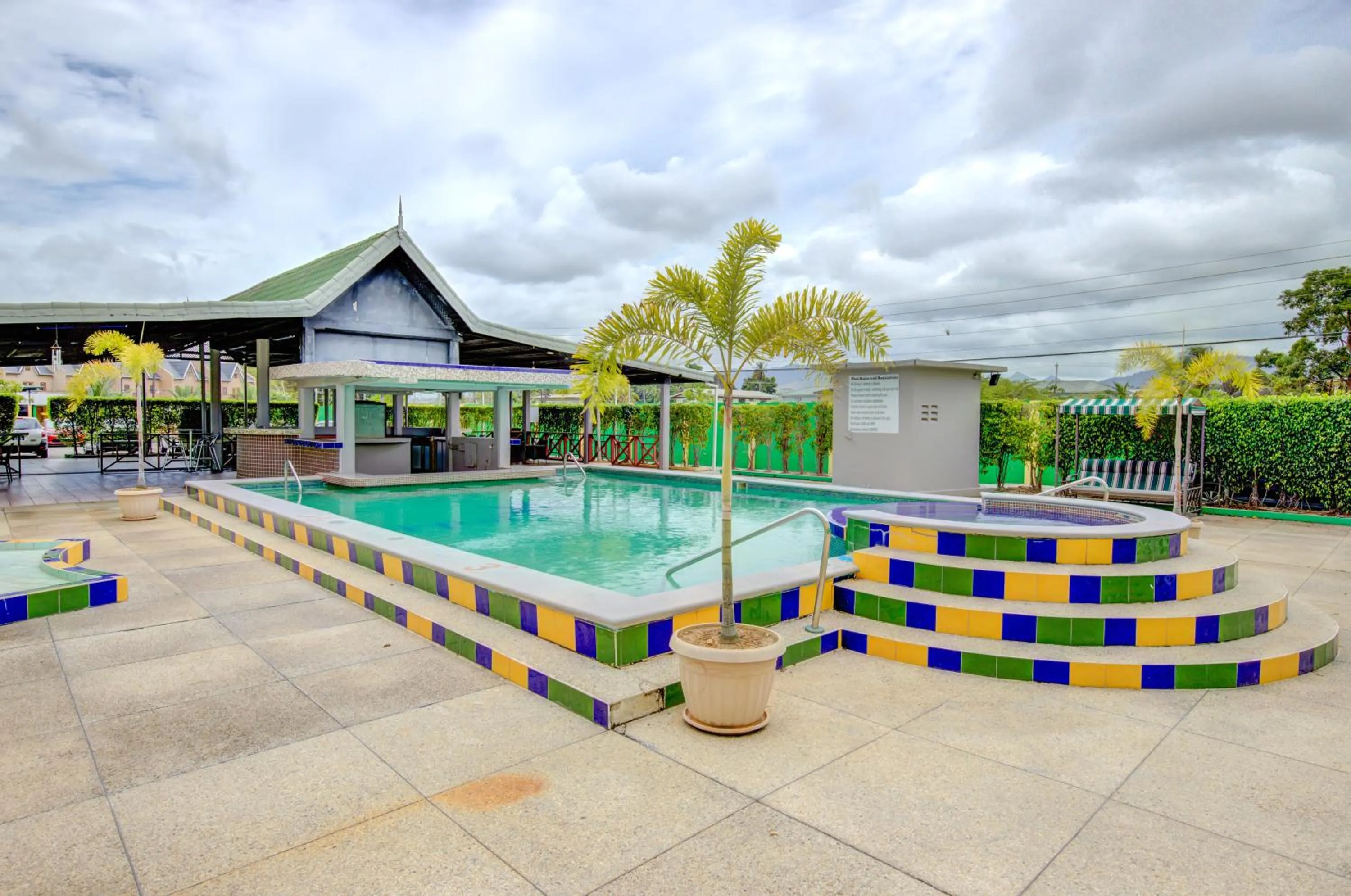 Swimming pool in Airport Suites Hotel