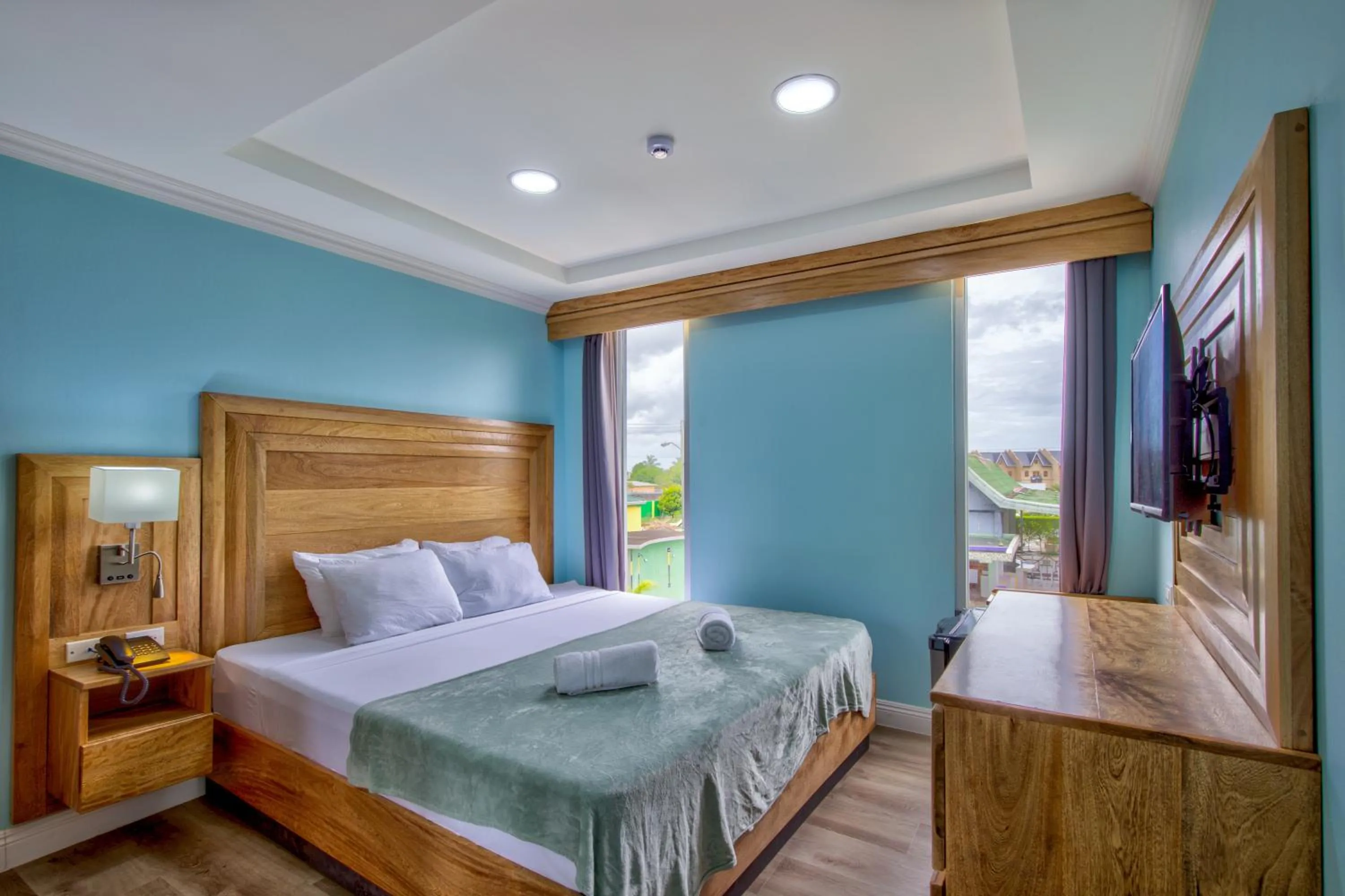 Bed in Airport Suites Hotel