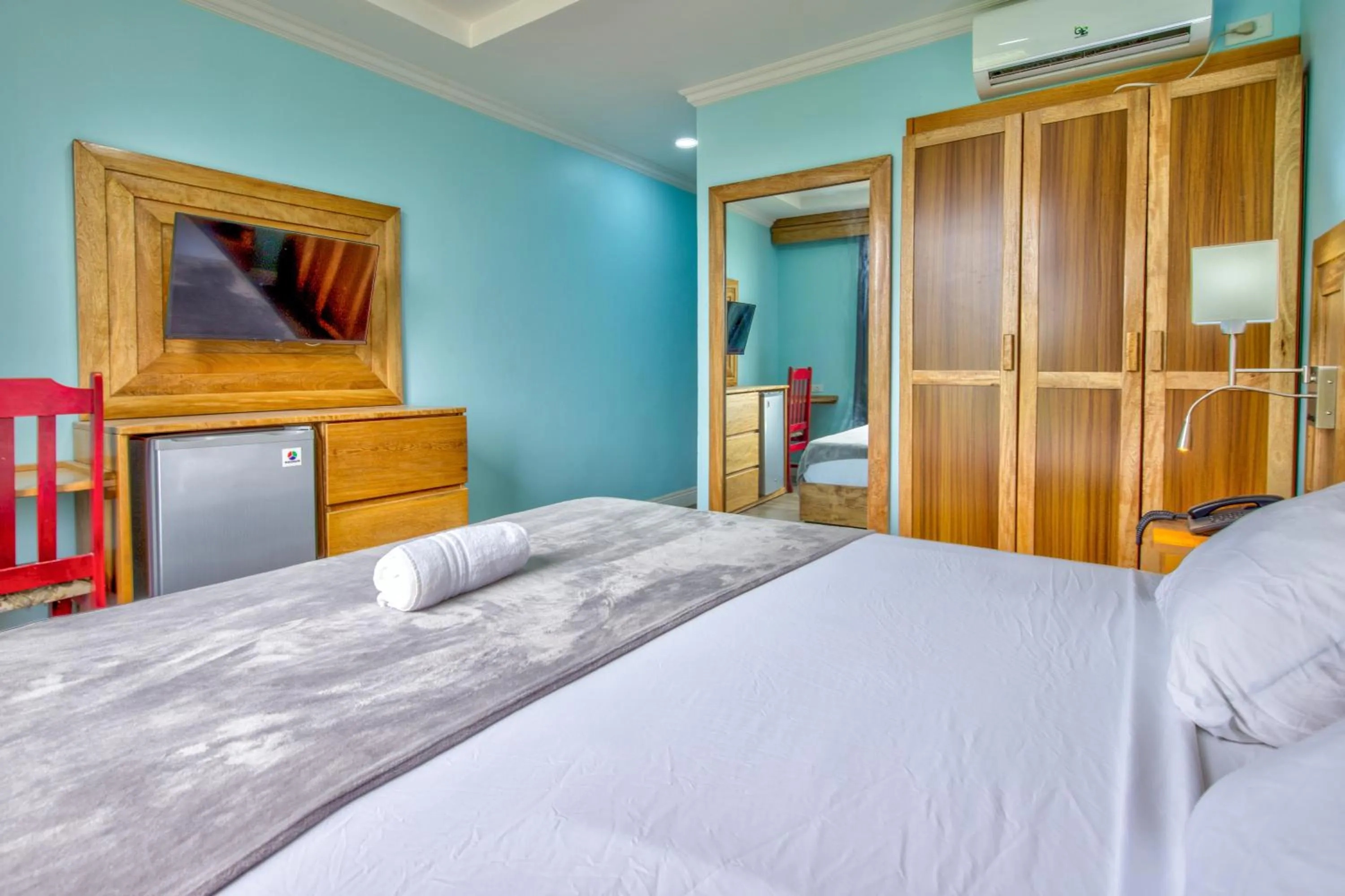 Bed in Airport Suites Hotel