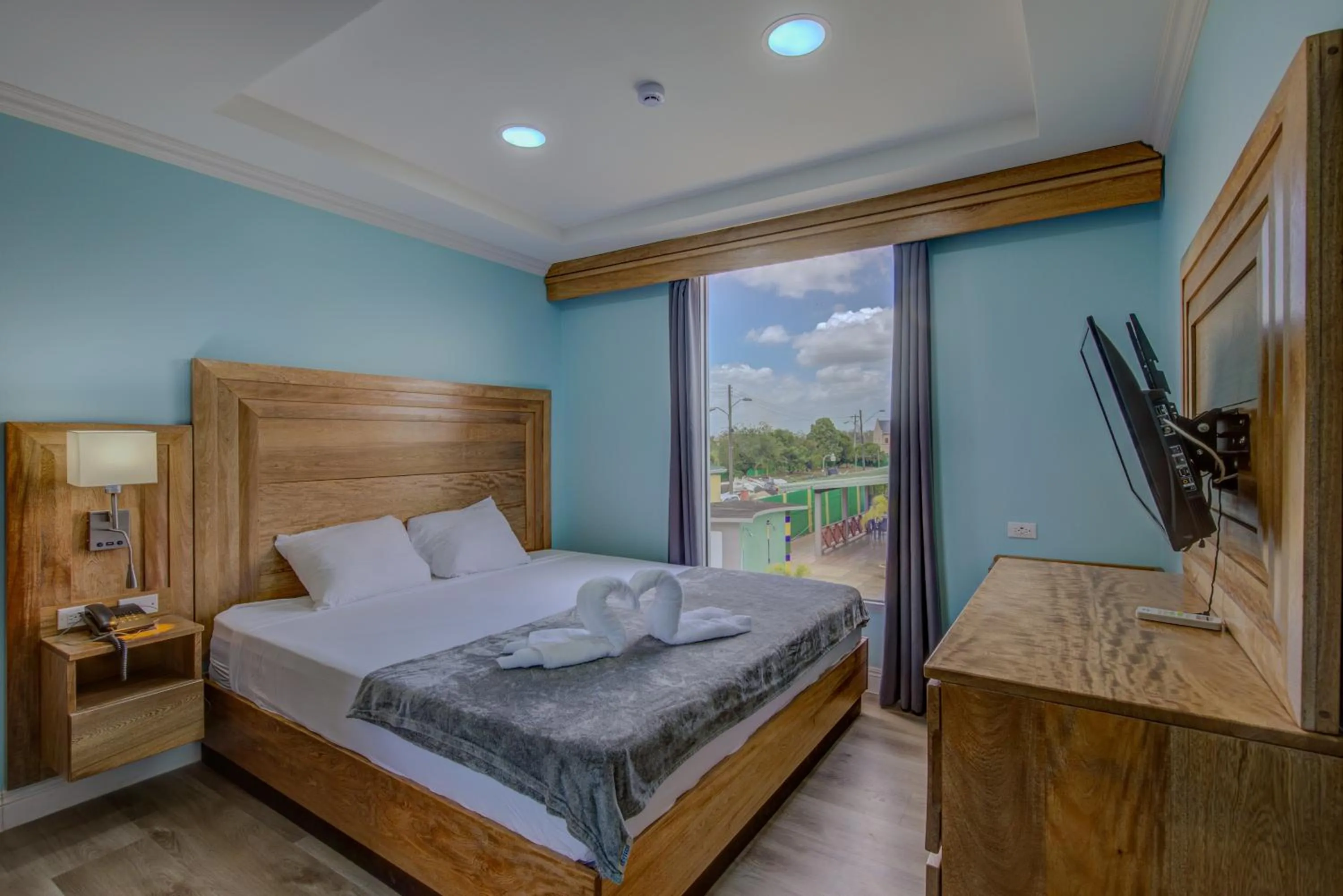 Bed in Airport Suites Hotel